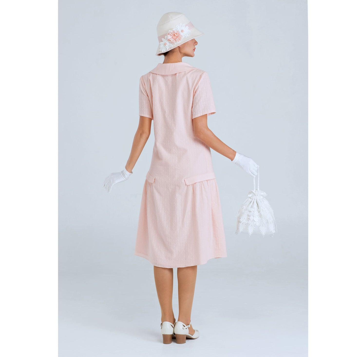 1920s dress of pale peach cotton with large puritan collar and short sleeves