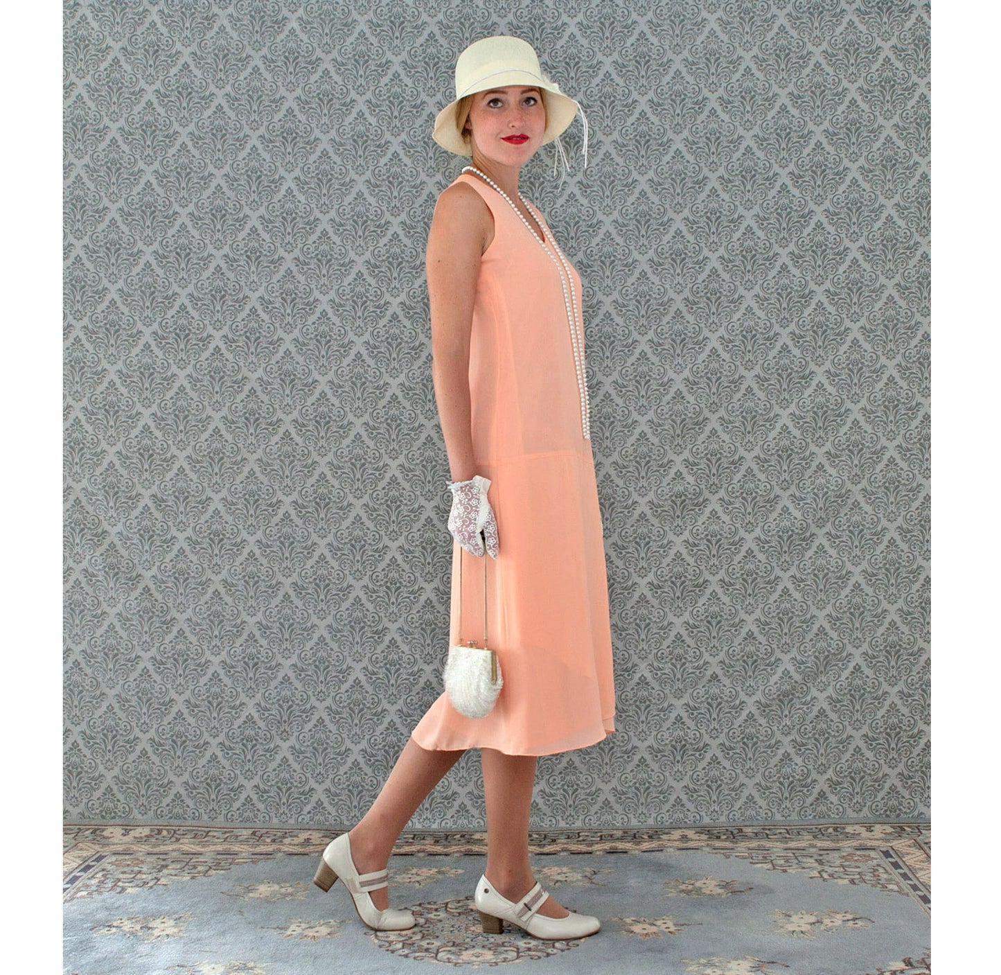Peach Great Gatsby chiffon dress with drape and bow