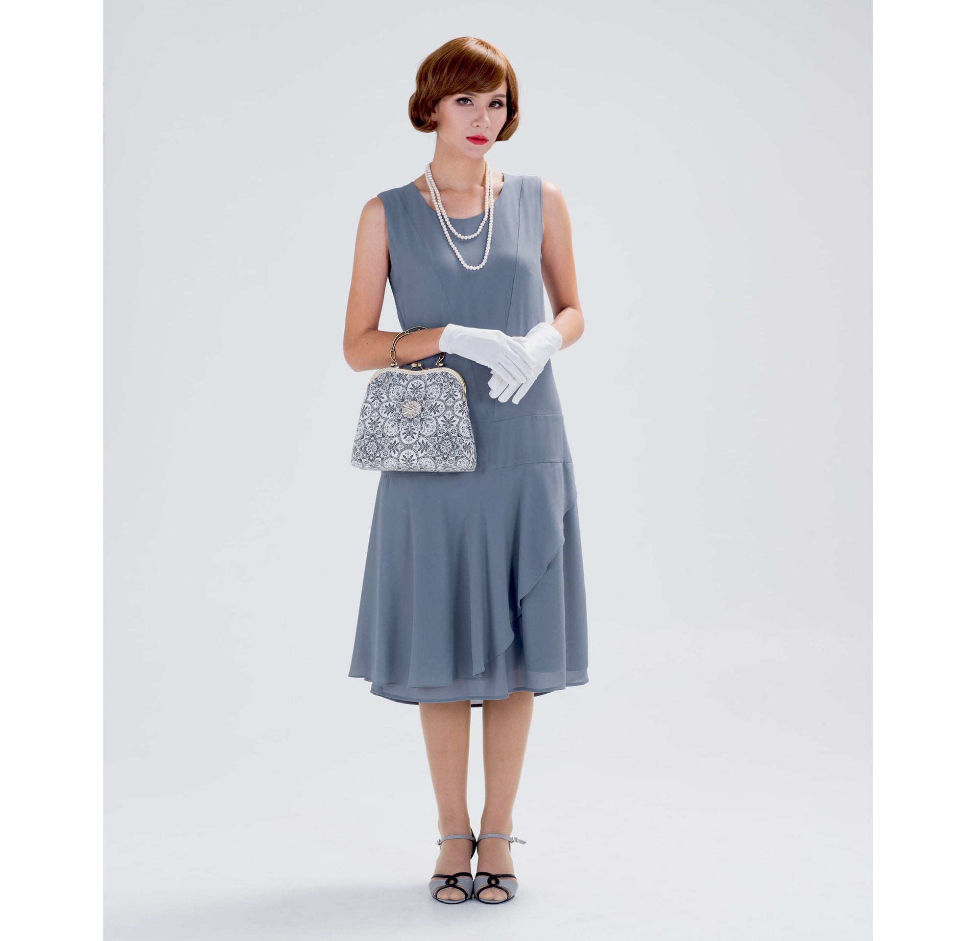 Grey 1920s chiffon high tea dress with a ruffled skirt detail - a vintage-inspired Roaring Twenties dress
