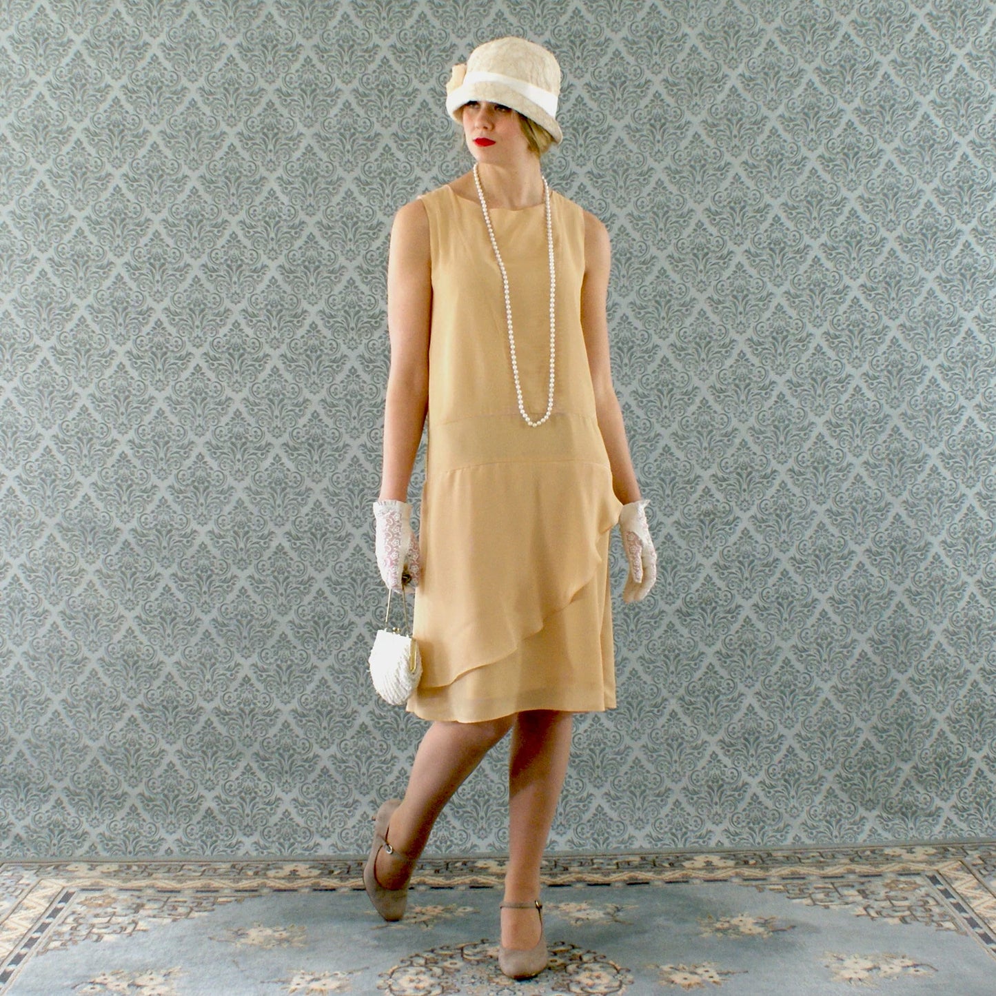 Pale marigold chiffon flapper dress with a ruffled skirt detail - a vintage-inspired Roaring Twenties dress