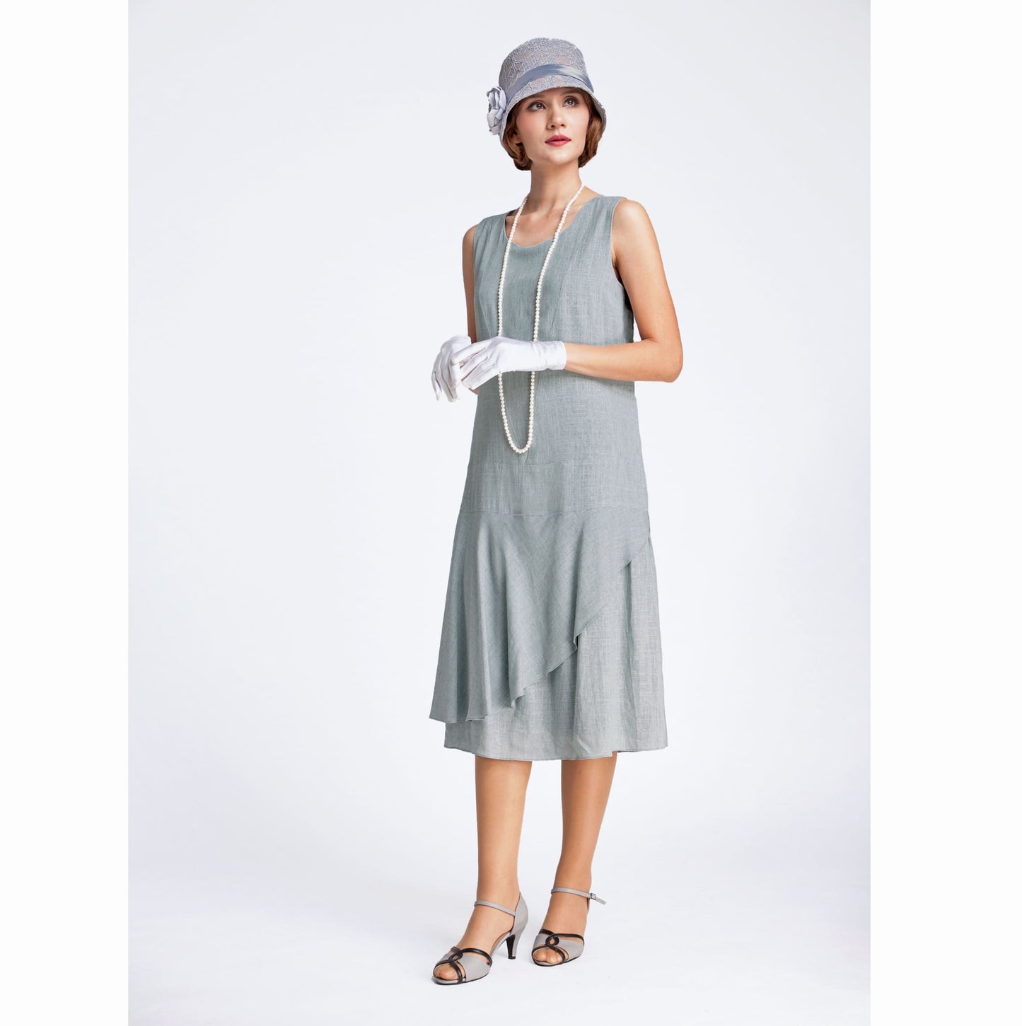 1920s dress in grey linen with a ruffled skirt detail