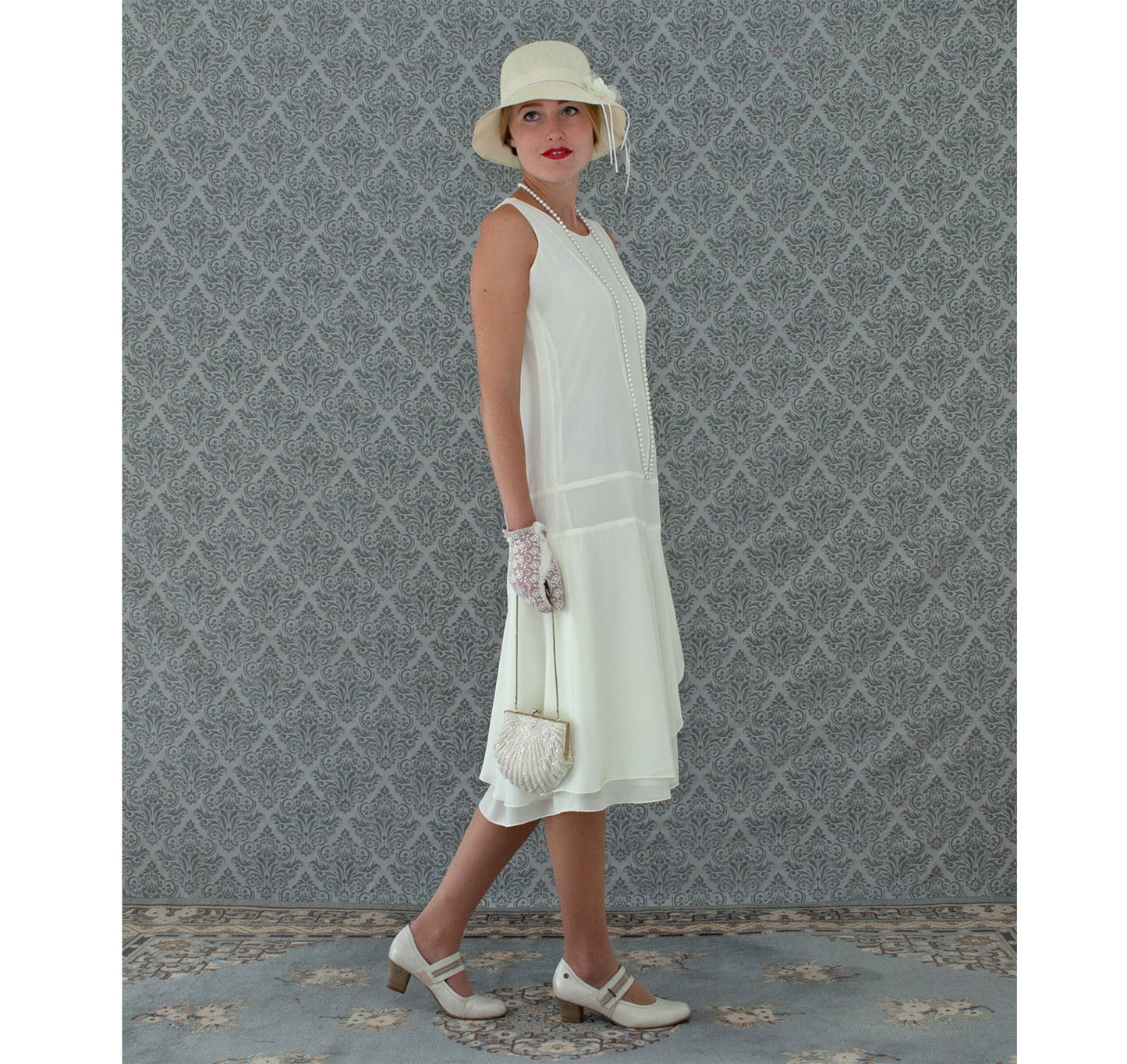 Cream chiffon flapper dress with a ruffled skirt detail