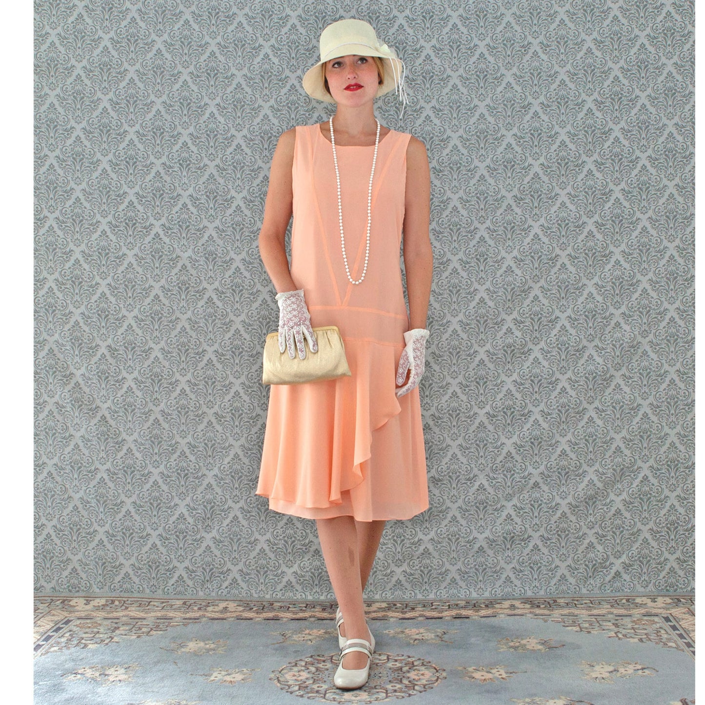 Peach 1920s chiffon dress with ruffled skirt detail - a vintage-inspired Roaring Twenties dress