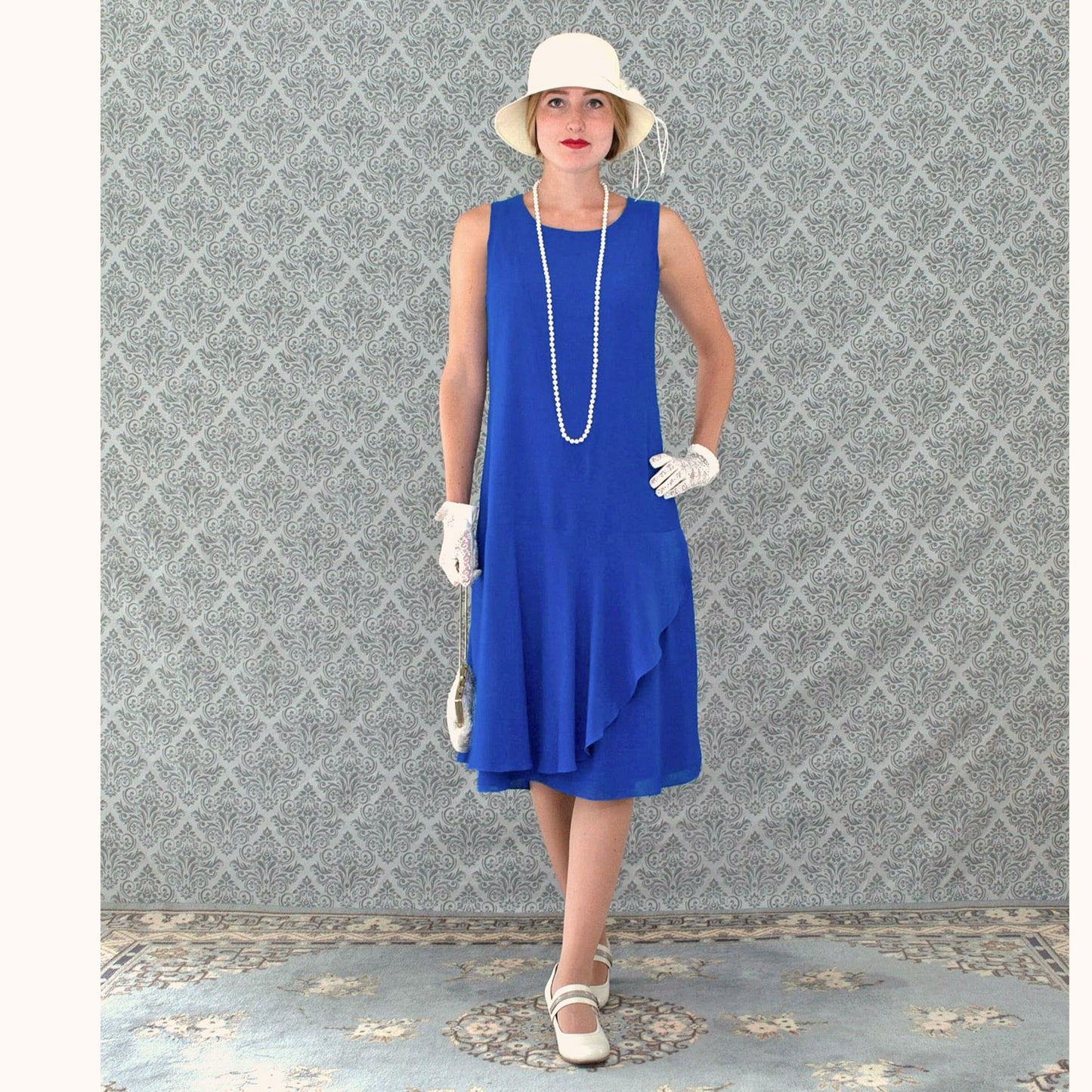 Sapphire blue drop waist chiffon dress with ruffled skirt detail - a vintage-inspired Roaring Twenties dress