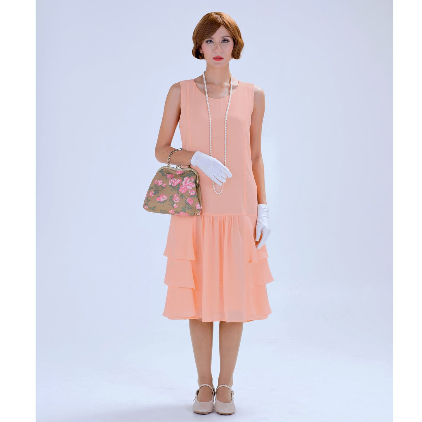 Peach 1920s chiffon dress with tiered skirt - a vintage-inspired Roaring Twenties dress