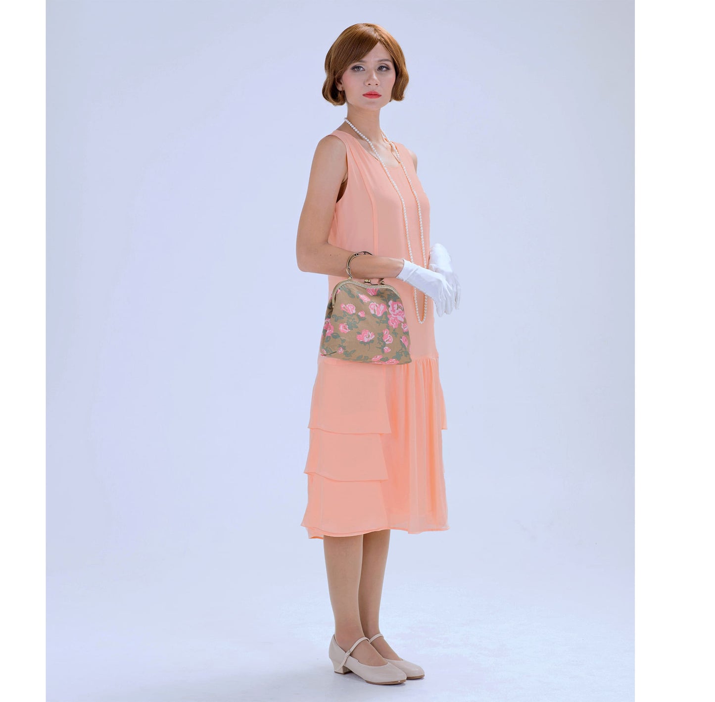 Peach 1920s chiffon dress with tiered skirt