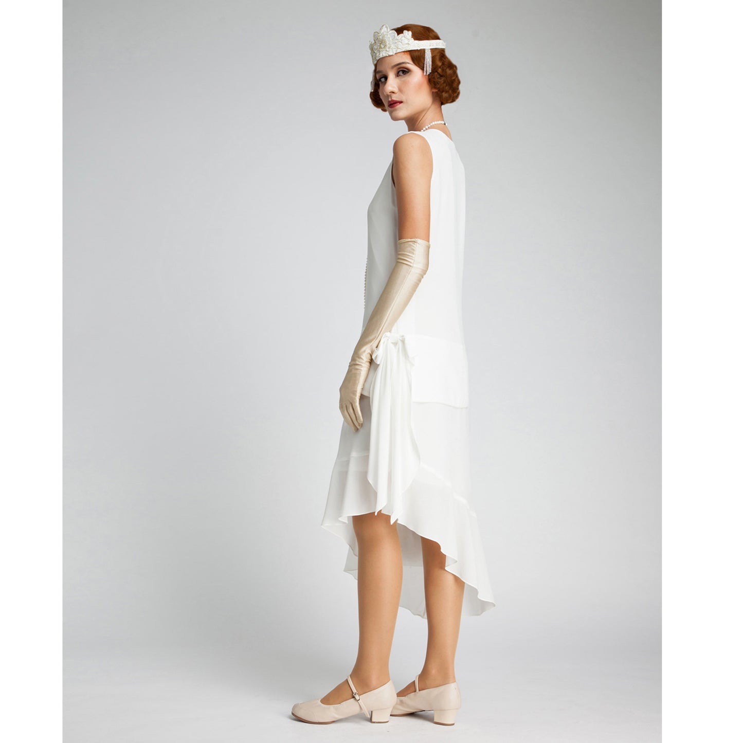 Off-white Great Gatsby dress with an asymmetrical skirt hem