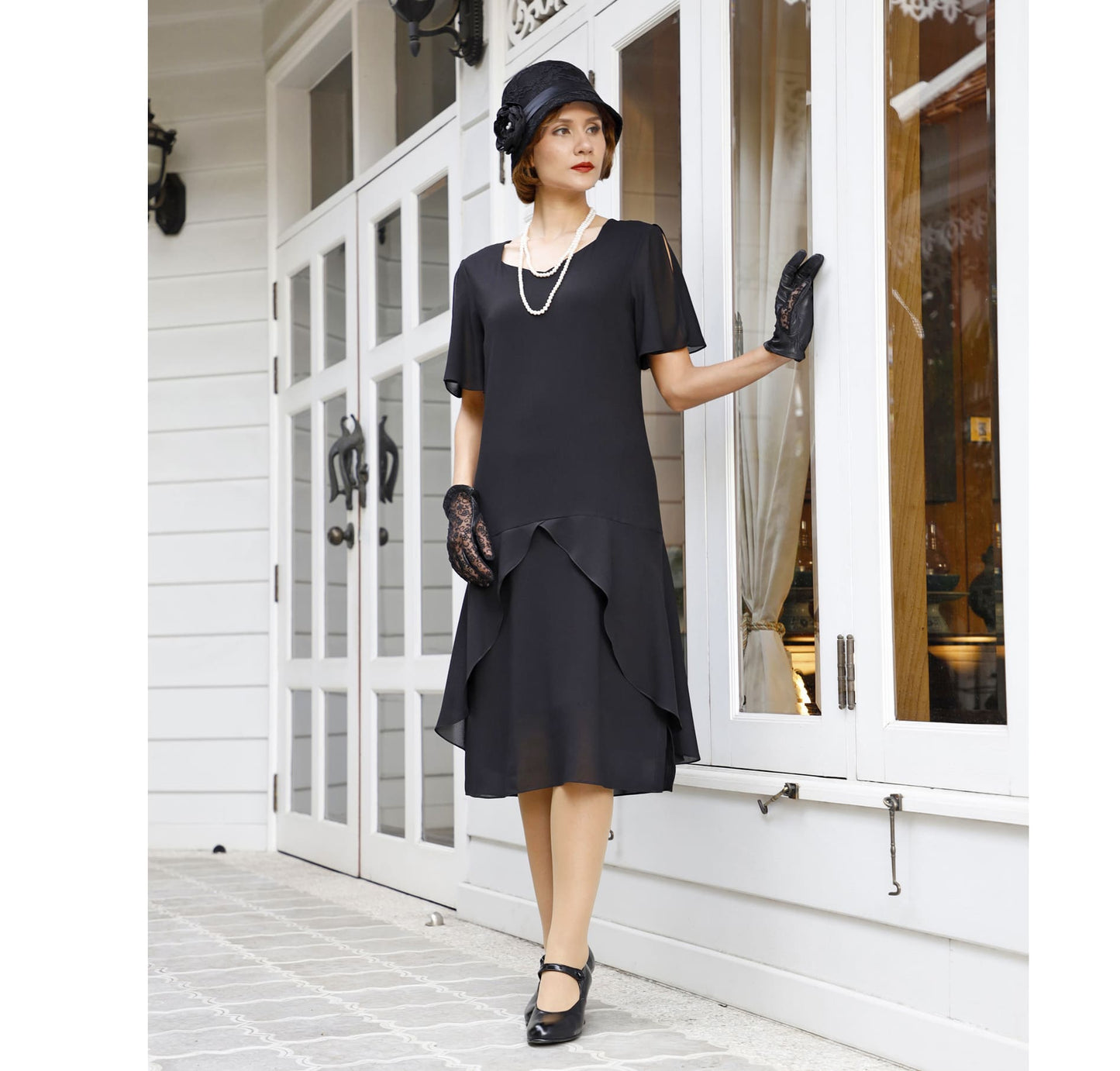 Black 1920s cloche hat with cotton and black lace