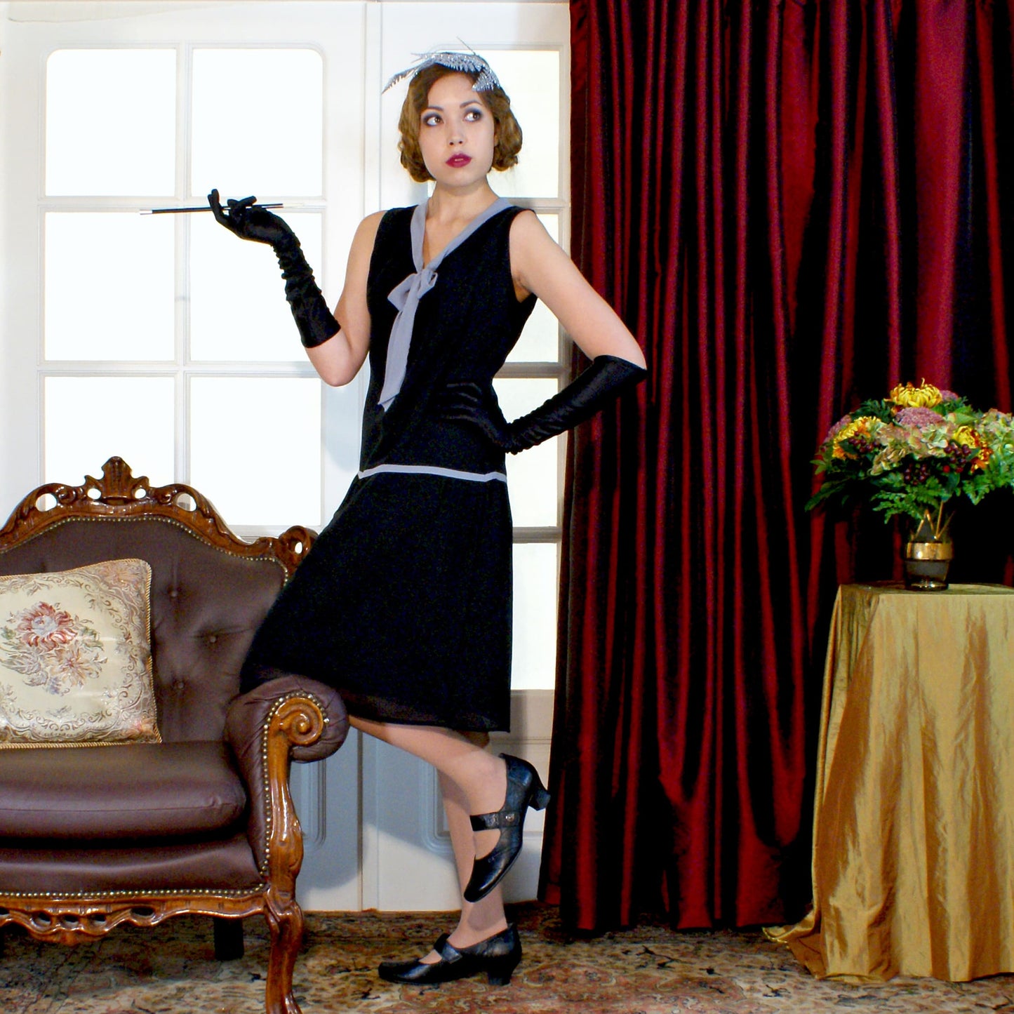 A lovely little black flapper dress with a grey bow - a vintage-inspired Roaring Twenties dress