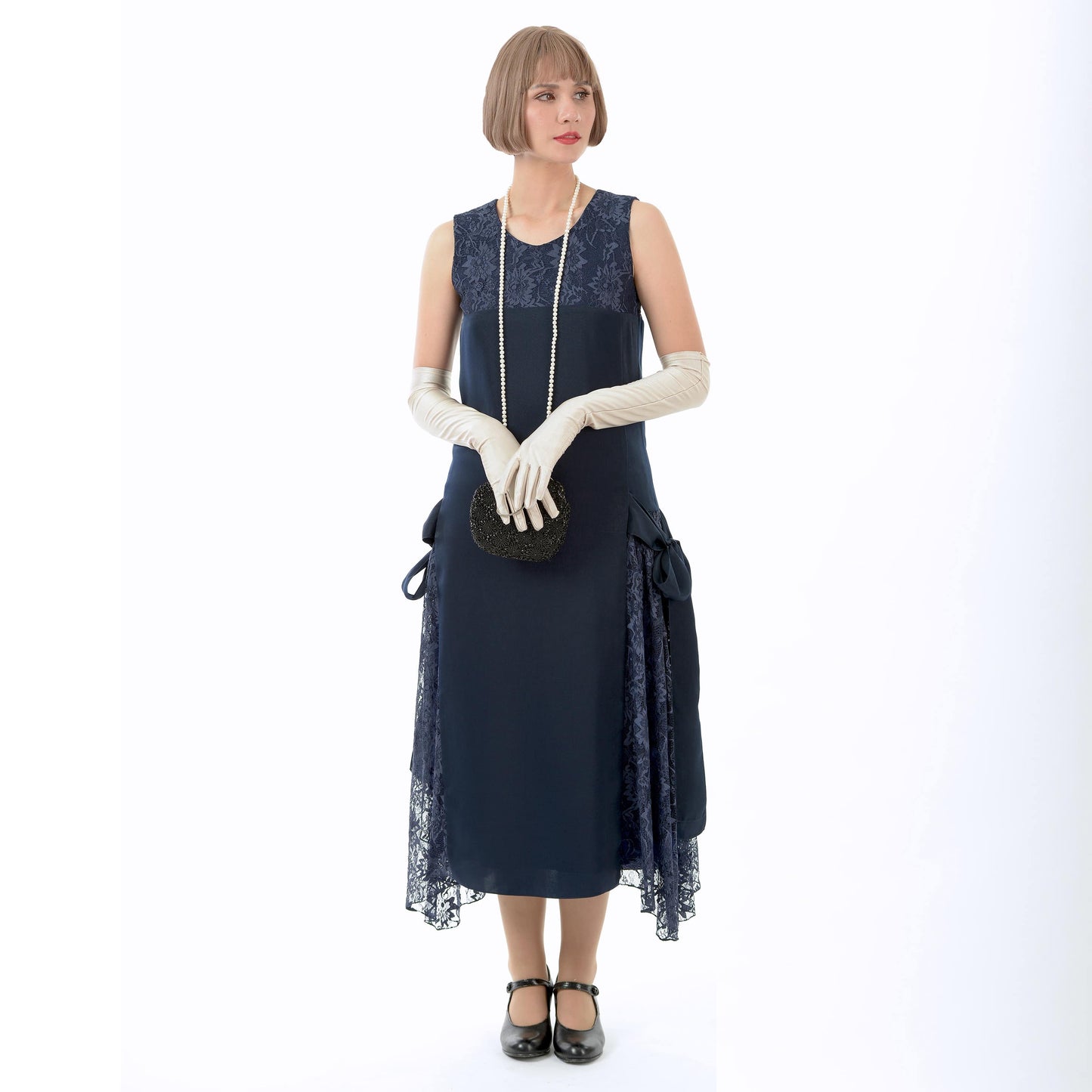 Dark blue Great Gatsby style dress made of satin and lace. The 1920s dress can be worm as a roaring 20s formal evening dress