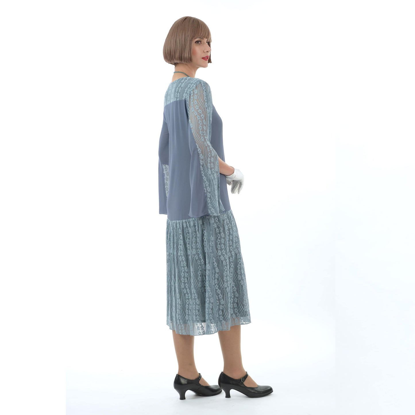 Grey Roaring 20s dress with long sleeves as a 1920s reproduction dress made of a combination of grey chiffon and lace fabrics.