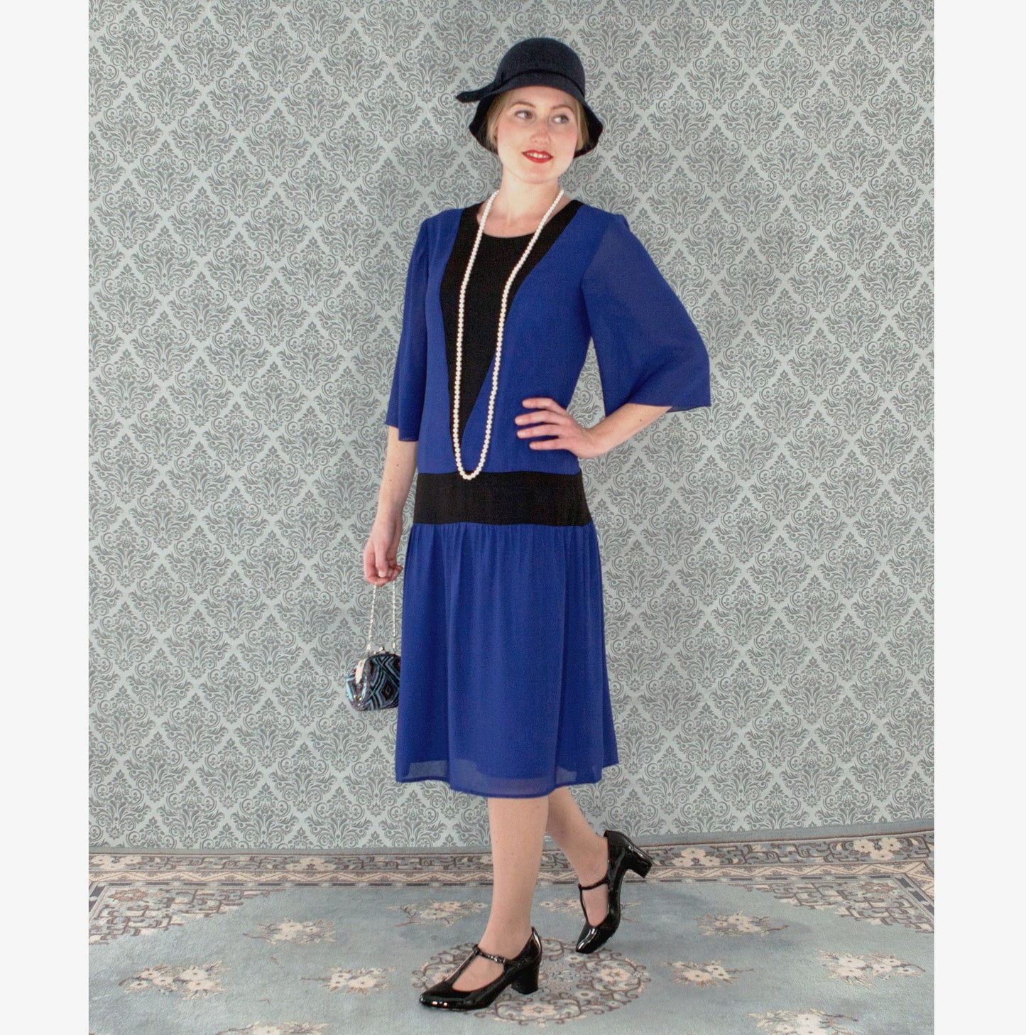 Dark blue and black roaring 20s fashion dress. The 1920s dress can be worn as a Charleston dress, Downton Abbey dress or Jazz Age lawn party dress.