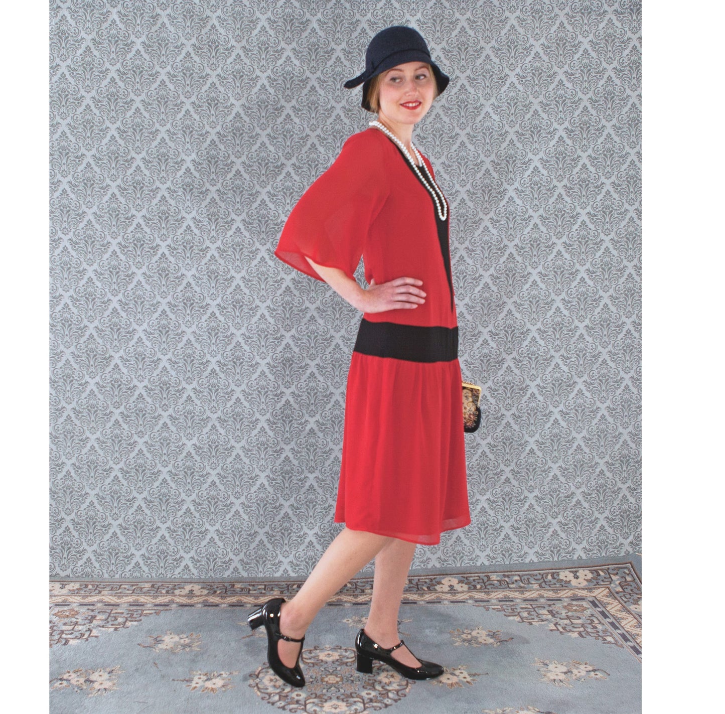 Red and black chiffon 1920s dress or flapper with elbow length sleeves. The roaring 20s dress can be worn as Great Gatsby dress or Charleston dress.