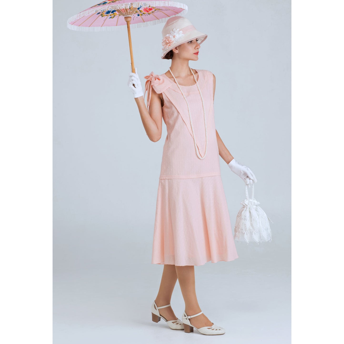 Sweet Downton Abbey cotton day dress in pale peach with a shoulder bow