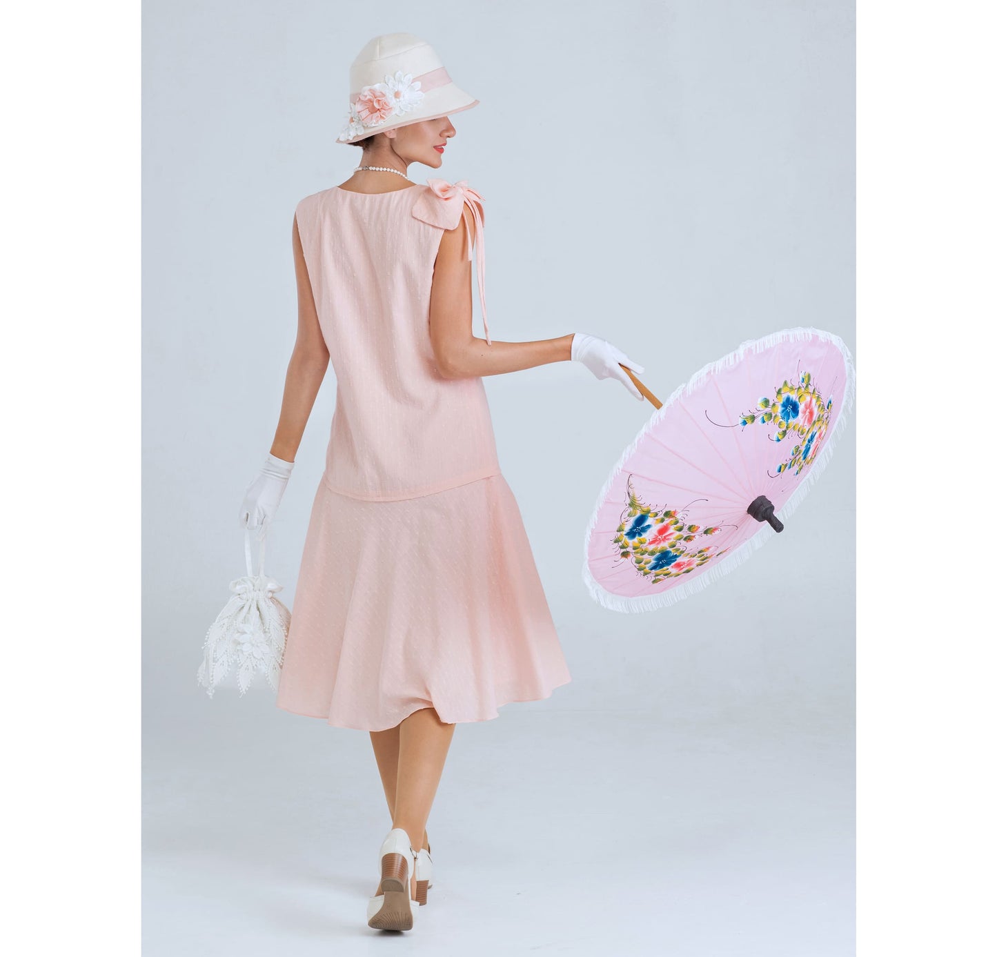 Sweet Downton Abbey cotton day dress in pale peach with a shoulder bow