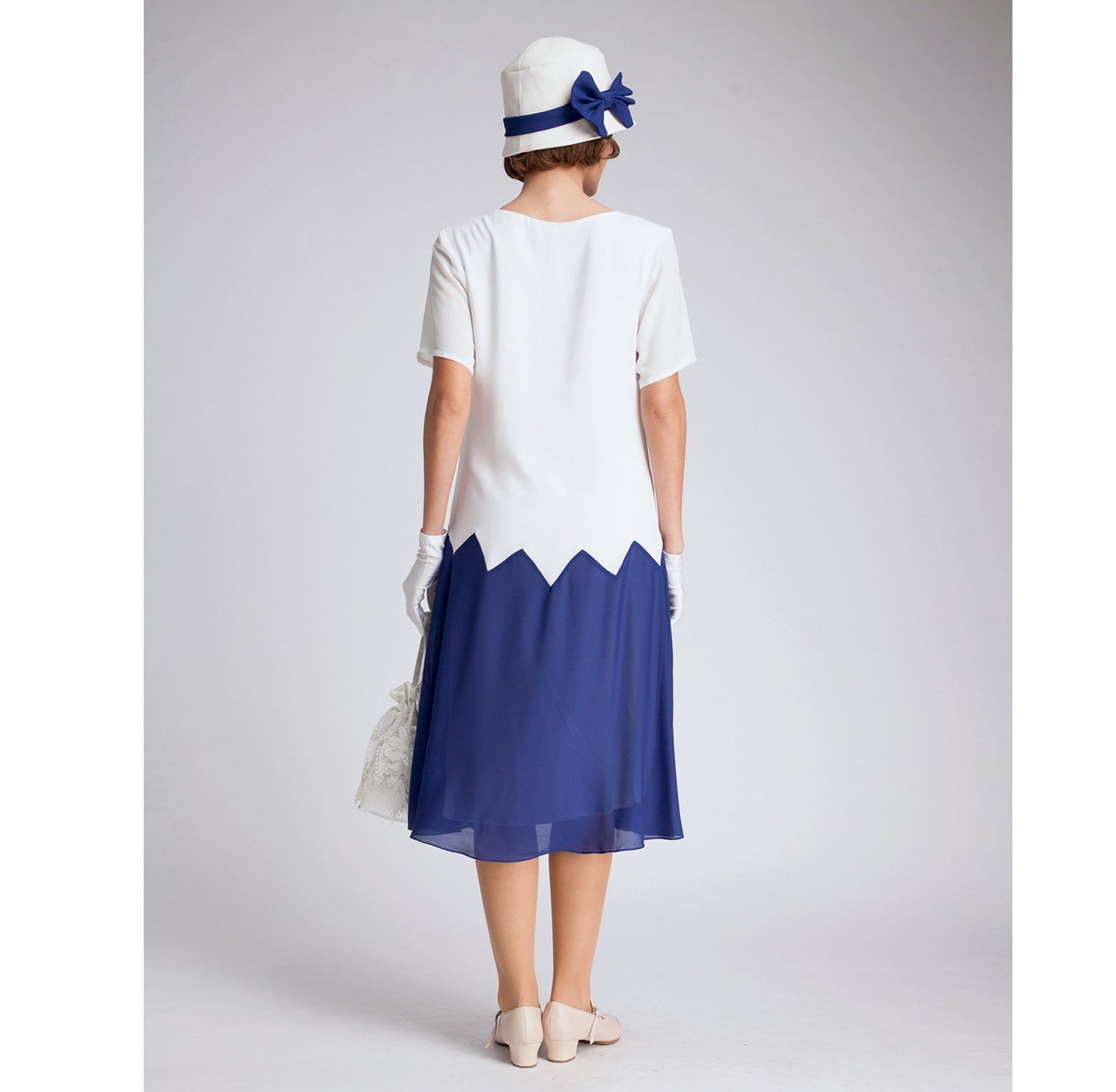 1920s-inspired dress in off-white & dark blue chiffon with zig zag details