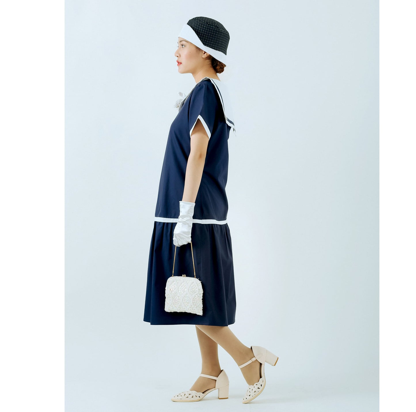 A 1920s sailor dress made of navy and pure white cotton, a marine dress perfect for a vintage summer