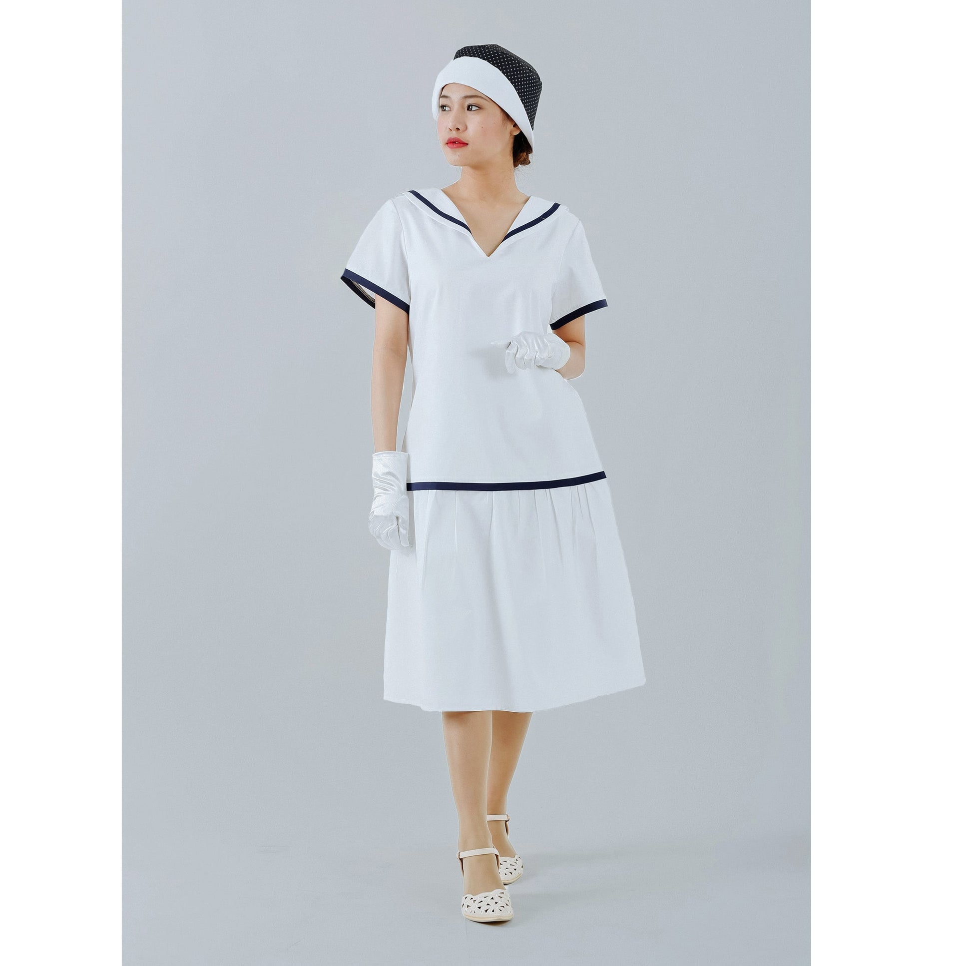White 1920s sailor dress with navy blue details - a vintage-inspired Roaring Twenties dress