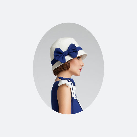 1920s cloche hat with off-white cotton and dark blue chiffon ribbon - a Roaring Twenties hat