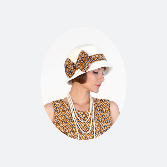 1920s cloche hat in off-white cotton and brown printed chiffon