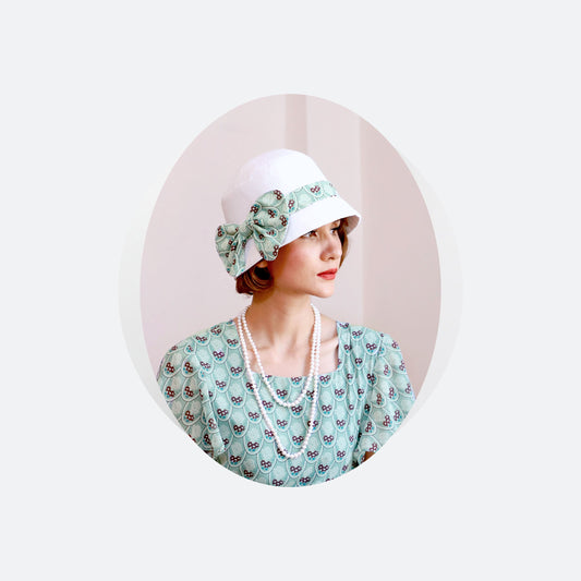 1920s cloche hat with off-white cotton and printed light green chiffon - a Roaring Twenties hat