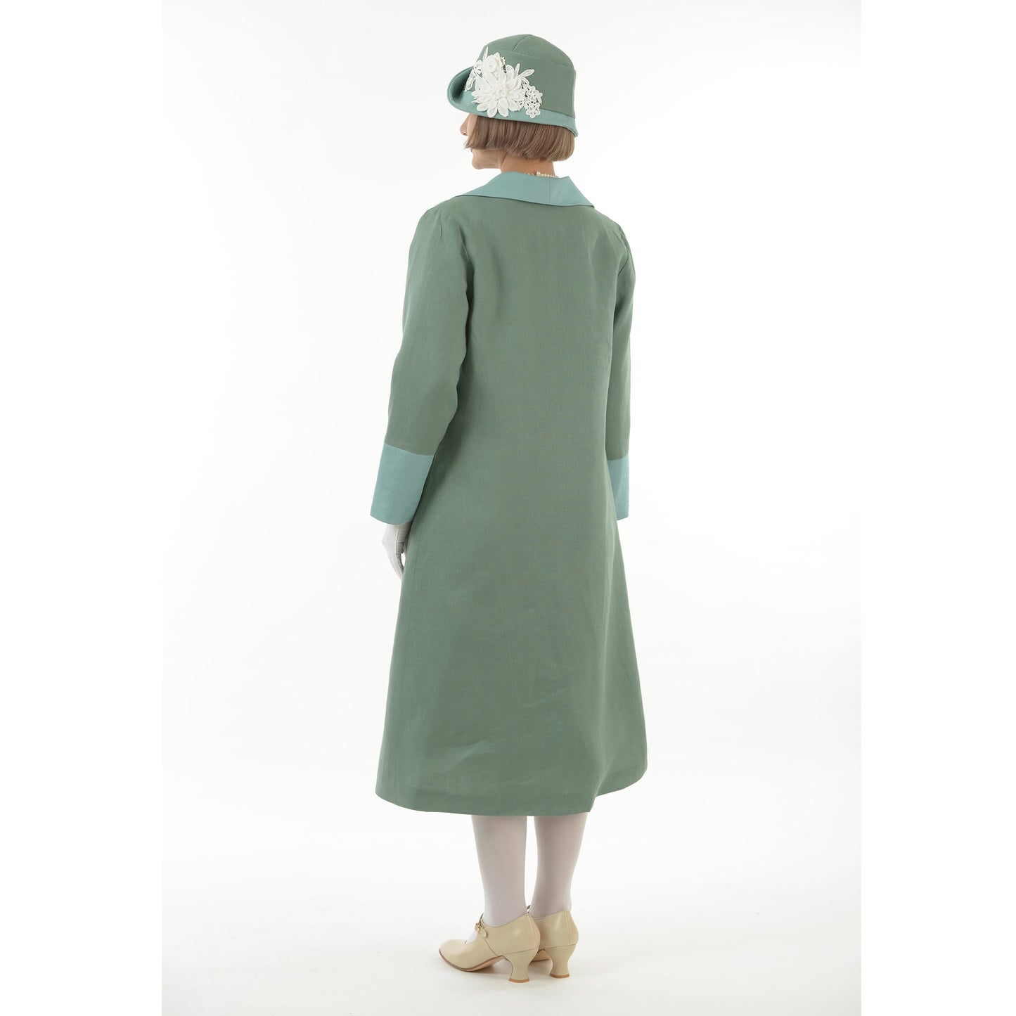 Flapper day coat in muted green linen and pastel blue details