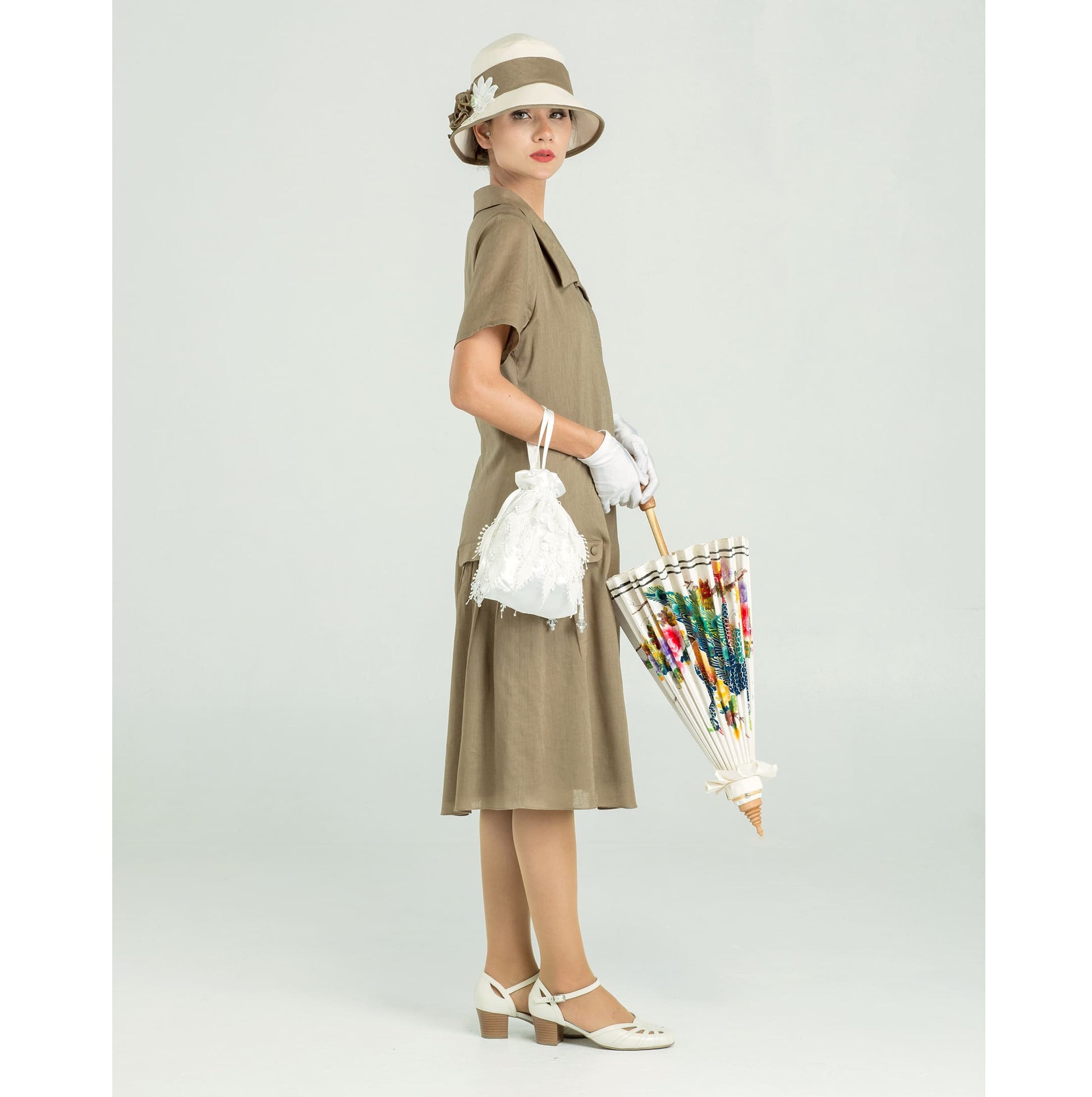 1920s day dress made of quality linen fabric in olive green. The 1920s high tea dress can be worn as a Jazz Age Lawn Party dress or a Downton Abbey dress.