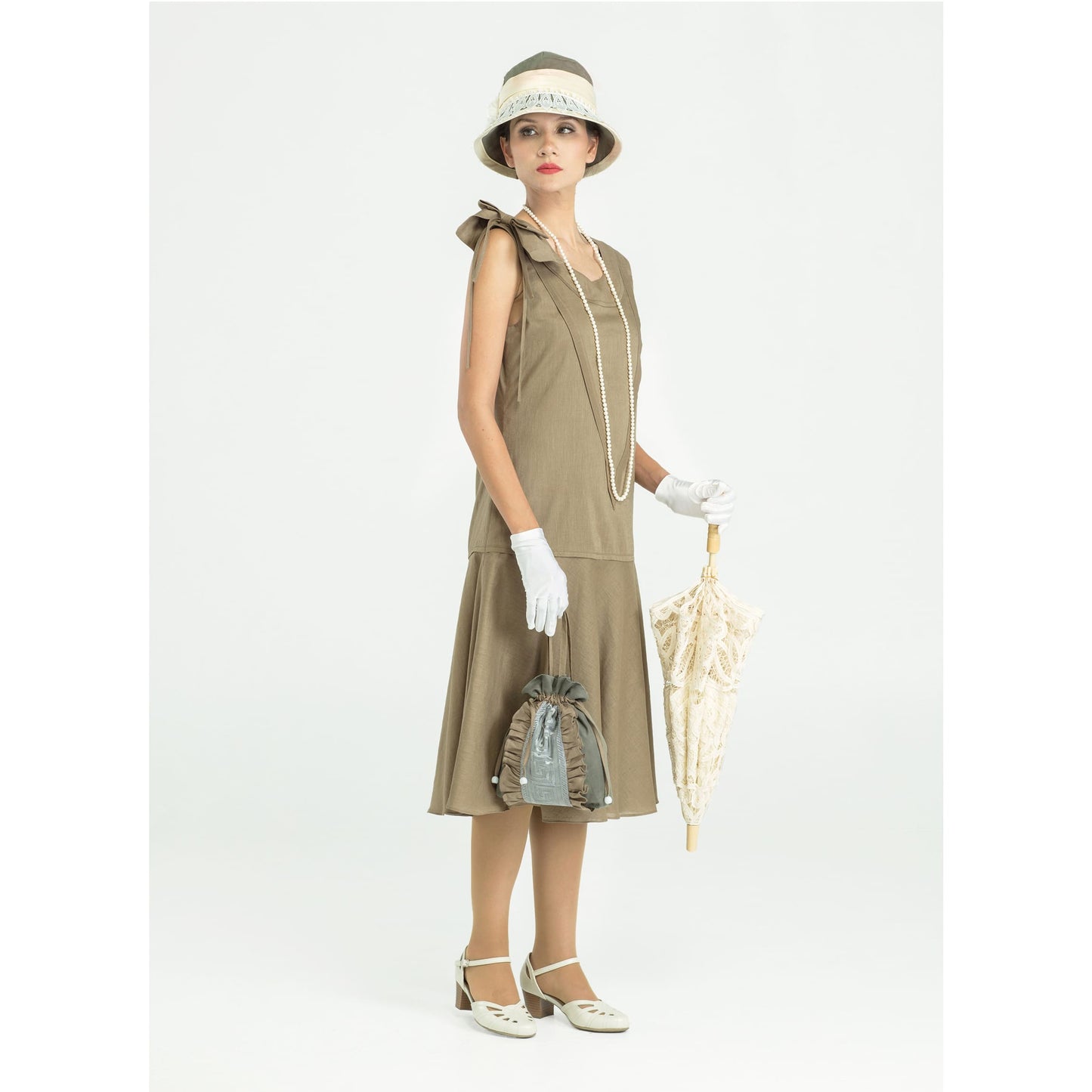 Sleeveless 1920s linen dress in olive green with bow on shoulder