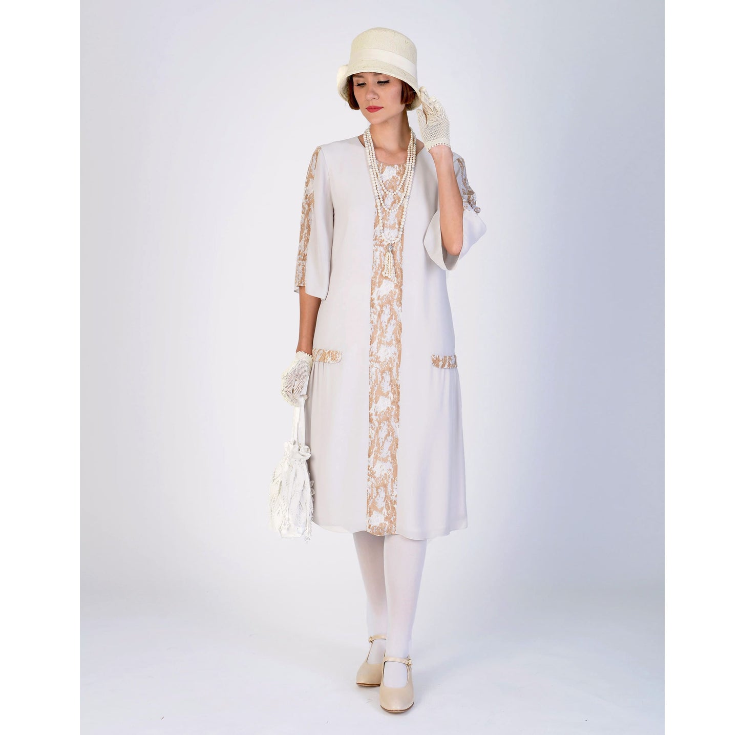 This 1920s day dress in bleached linen and printed brown can be worn as a Great Gatsby dress or a Downton Abbey tea dress.