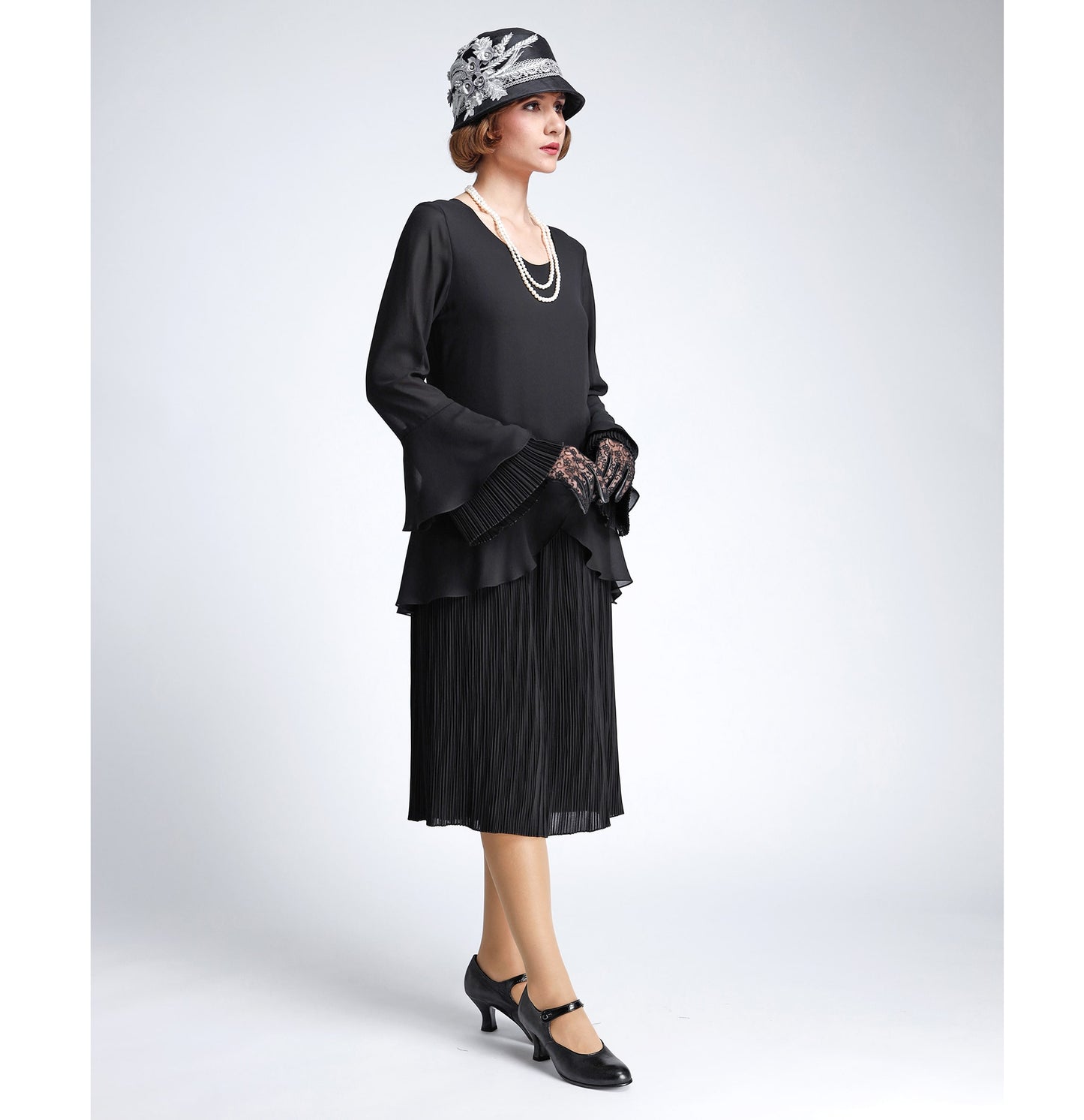 This black chiffon 1920s dress with plisse pleat details can be worn as a Great Gatsby dress or a Downton Abbey dress.
