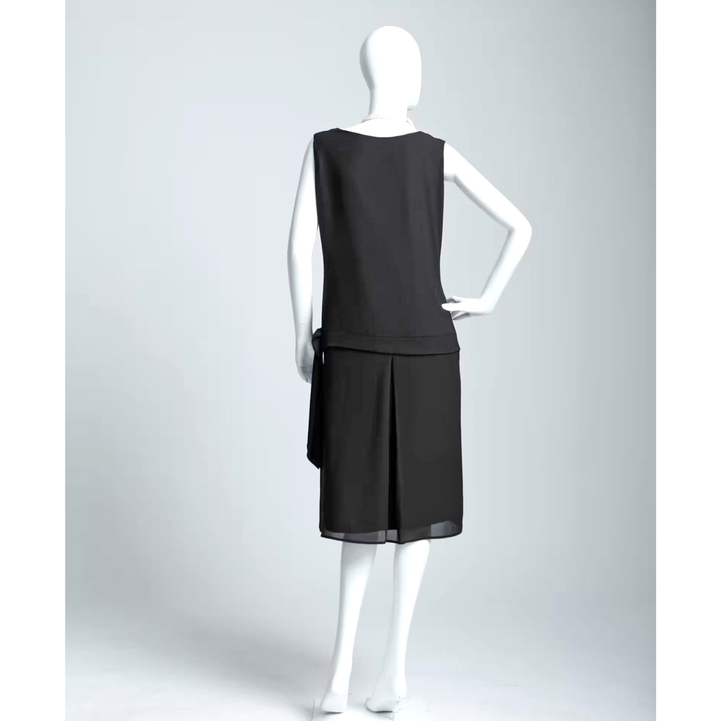 Sleeveless black chiffon and lace flapper dress