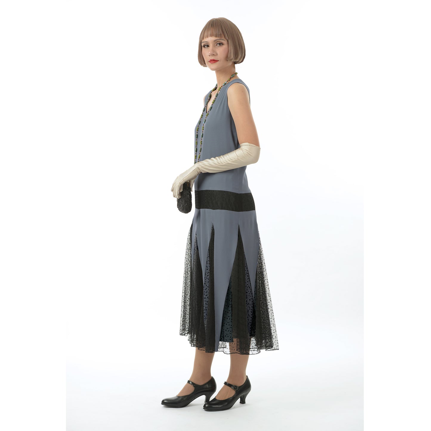Grey chiffon 1920s formal dress with black tulle lace and zig zag details. The 1920s dress can be worn as Great Gatsby evening dress or roaring 20s flapper dress.