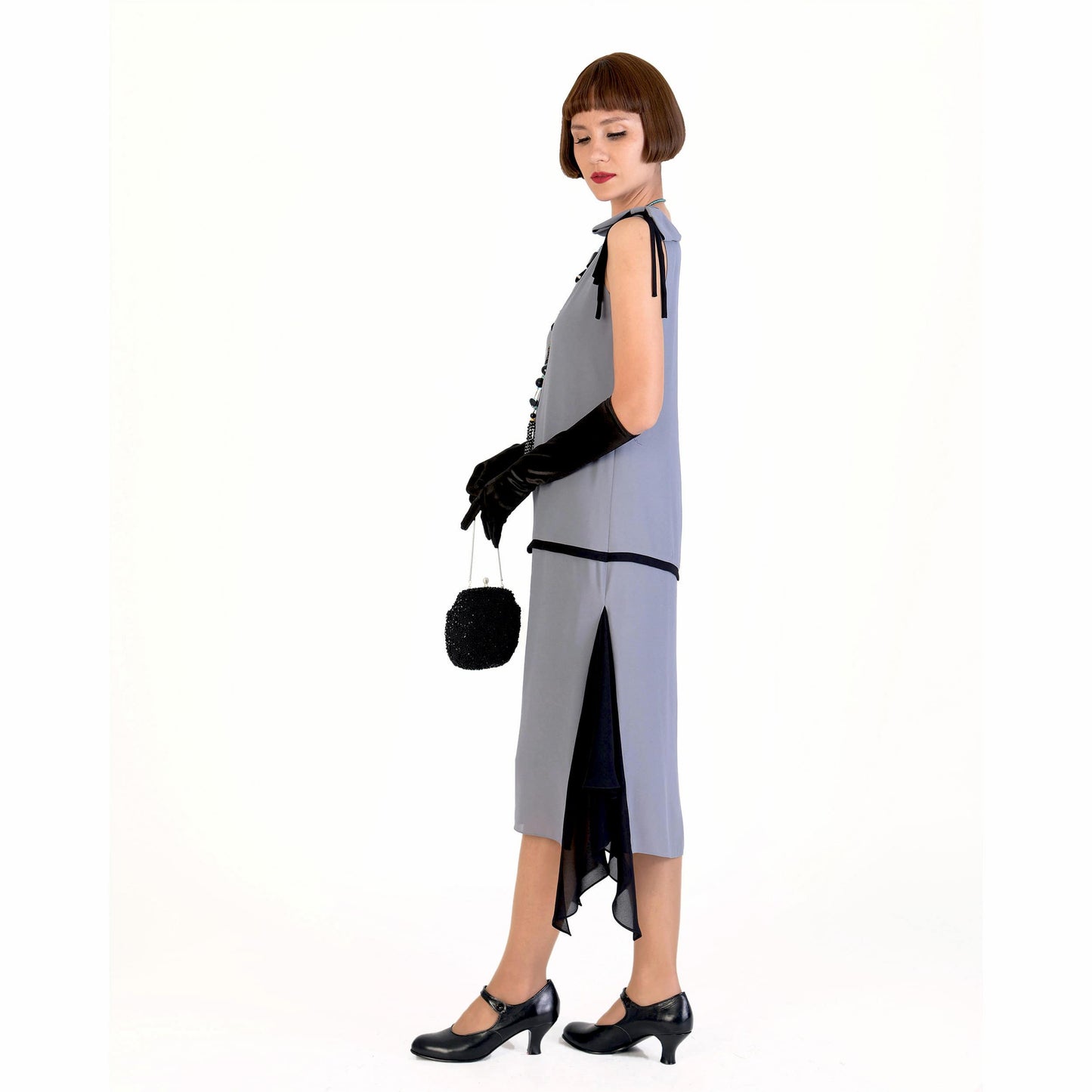 1920s dress made of grey chiffon with black details. It is a 1920s evening dress, that can be worn as a Gatsby dress, Downton Abbey dress or flapper.