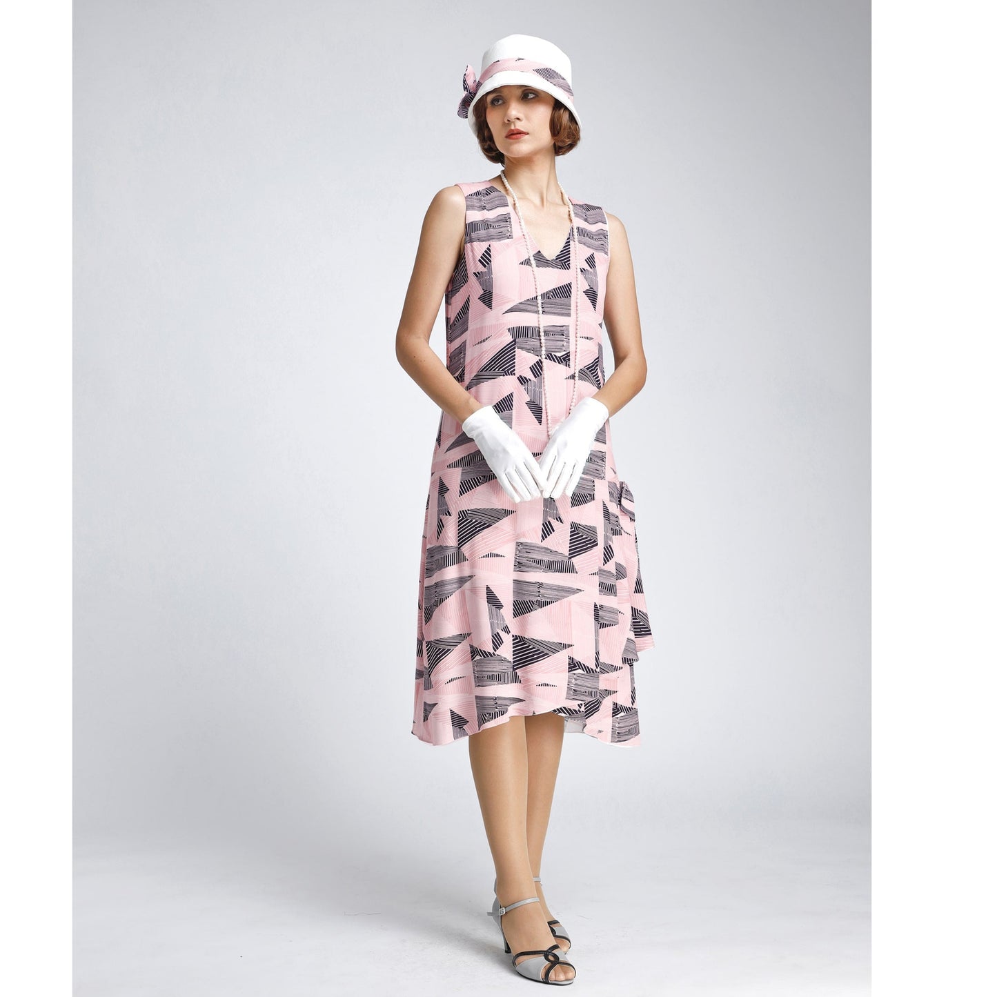 1920s-inspired rayon flapper dress in pink and black with drape and bow