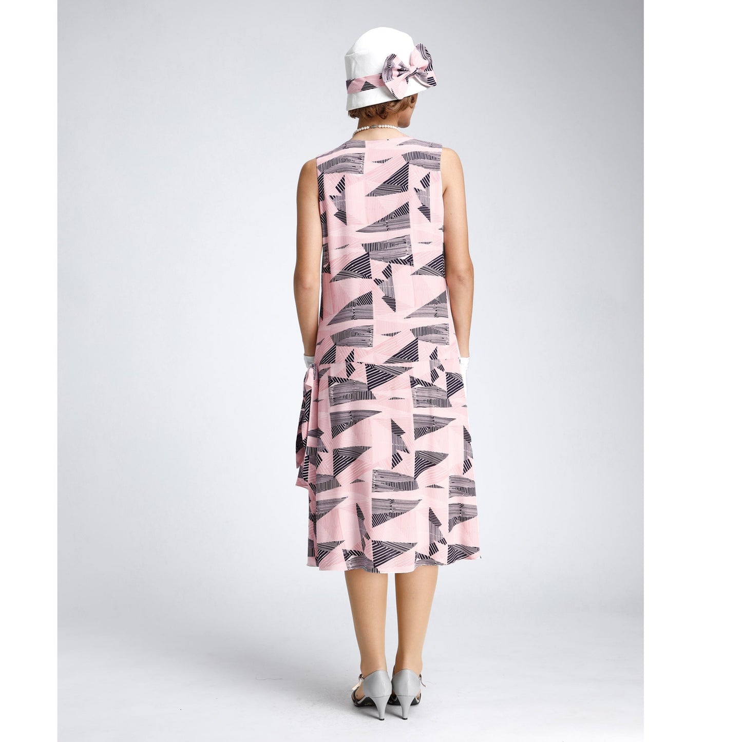1920s-inspired rayon flapper dress in pink and black with drape and bow