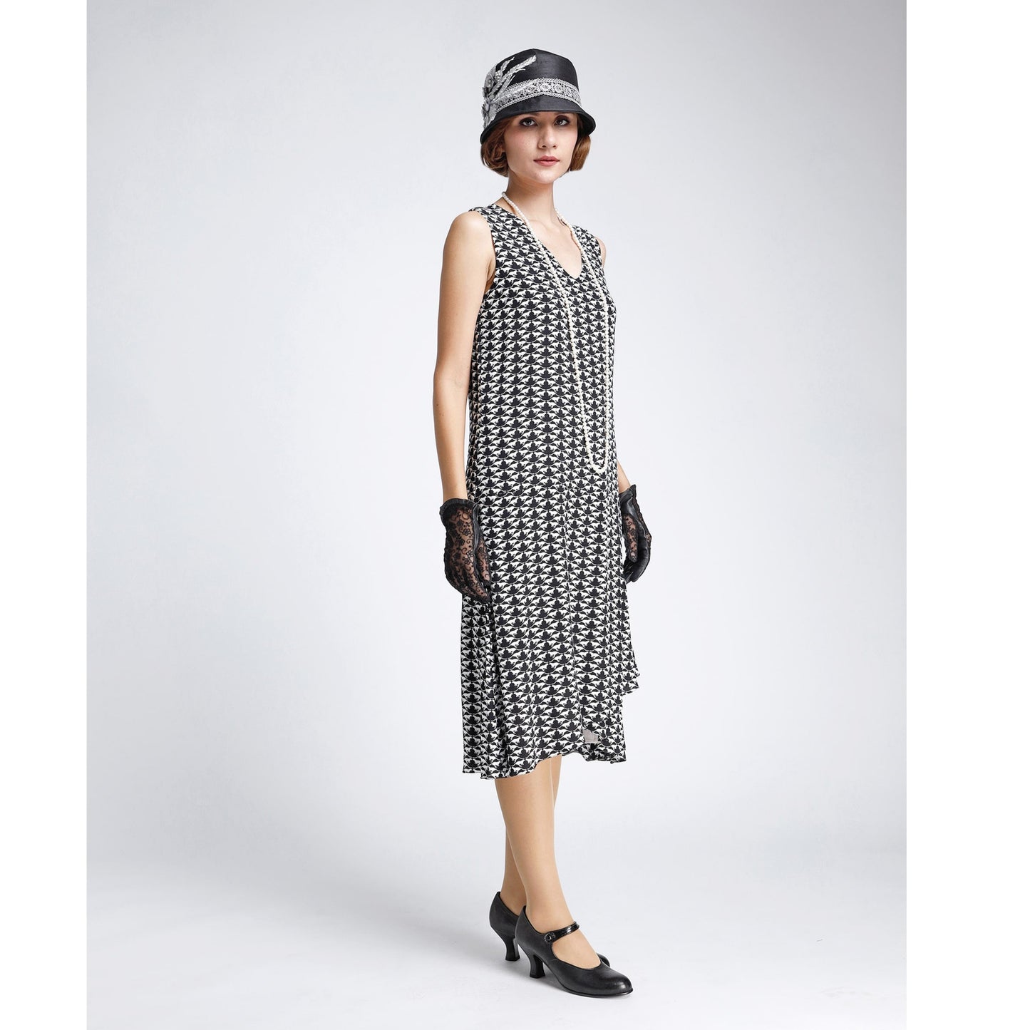 Black and white 1920s dress with a drape and bow. The roaring 20s dress can be worn as a flapper dress, Great Gatsby dress or Downton Abbey dress