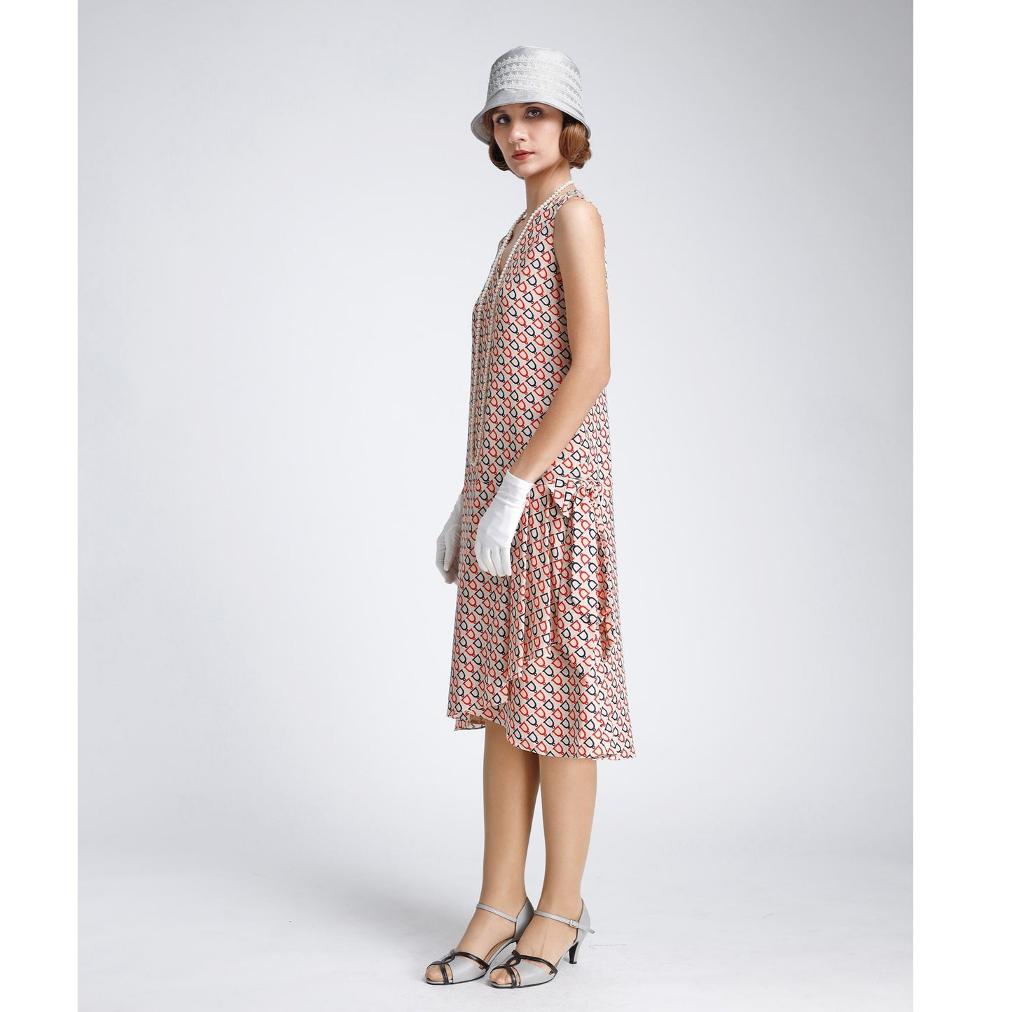 Art deco 1920s-inspired Gatsby dress in nude, dark blue and red print