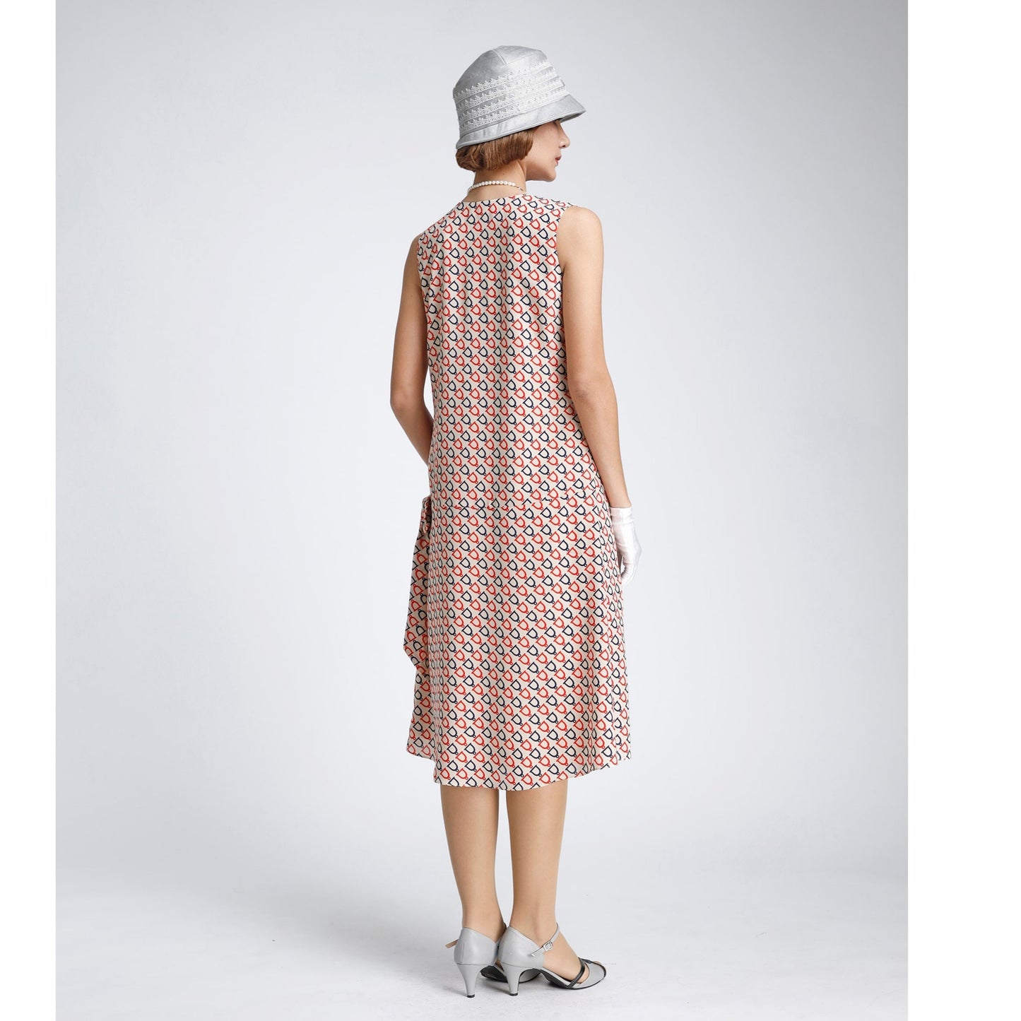 Art deco 1920s-inspired Gatsby dress in nude, dark blue and red print