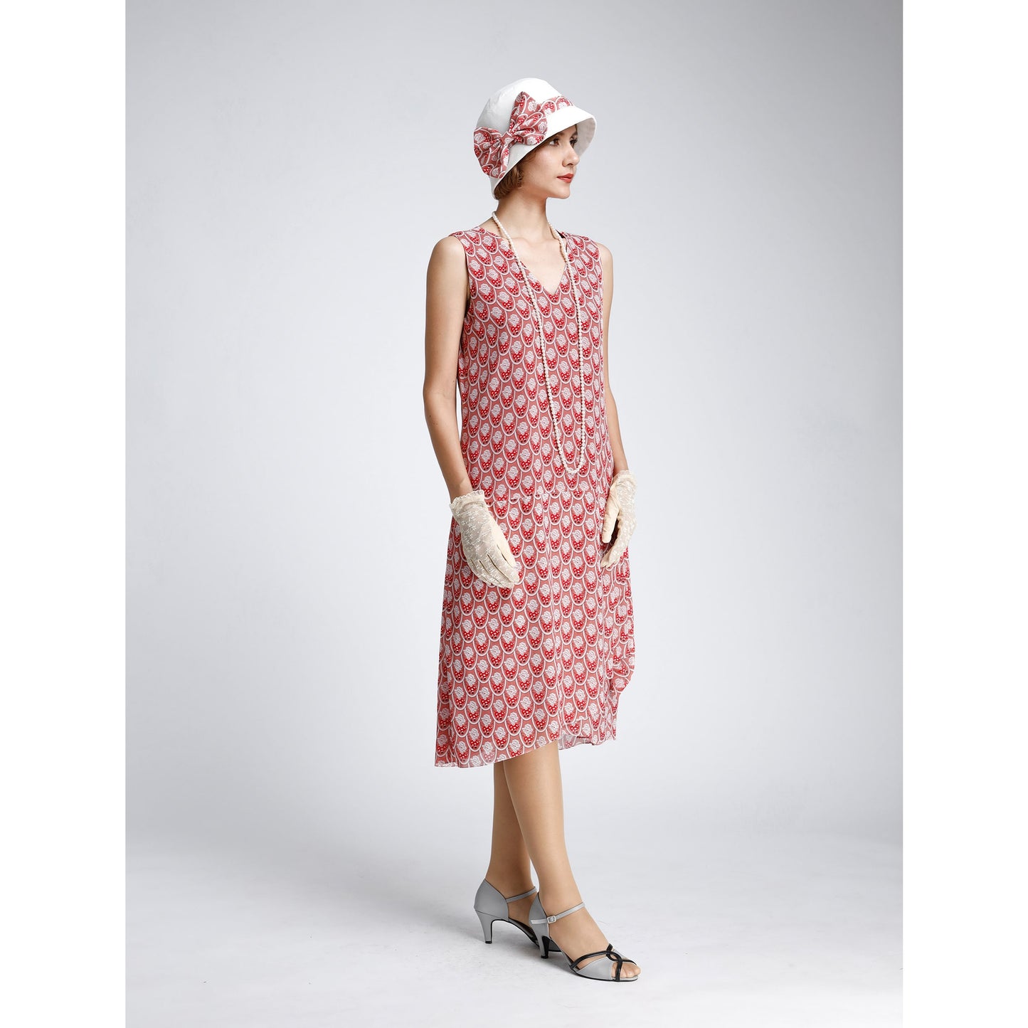 1920s dress in red deco print with drape and bow. This 1920s fashion can be worn as Great Gatsby summer dress, Downton Abbey dress or high tea dress.