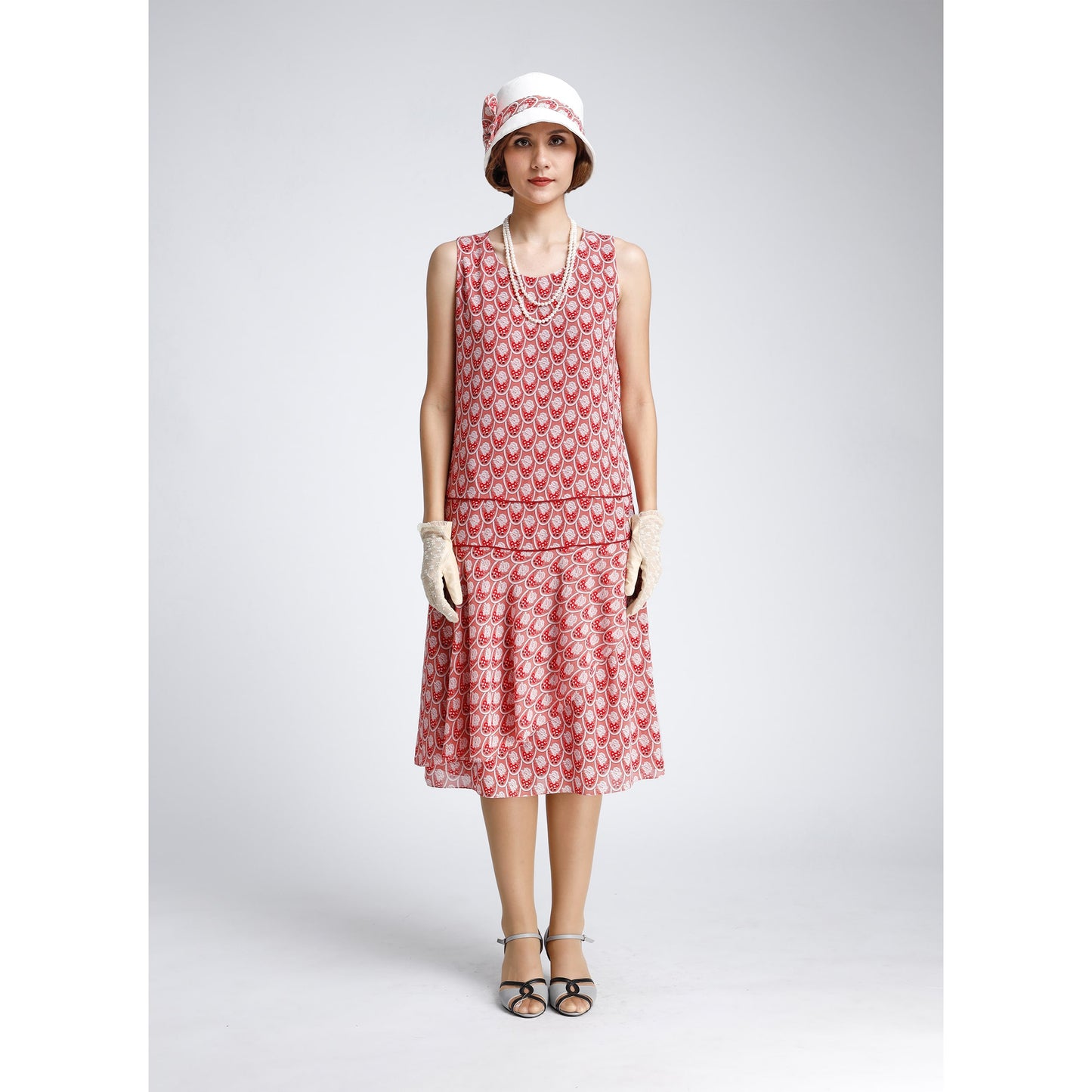 Red chiffon flapper day dress with deco print and a ruffled skirt. The 1920s dress can be worn as Great Gatsby dress, flapper dress or 20s high tea dress.