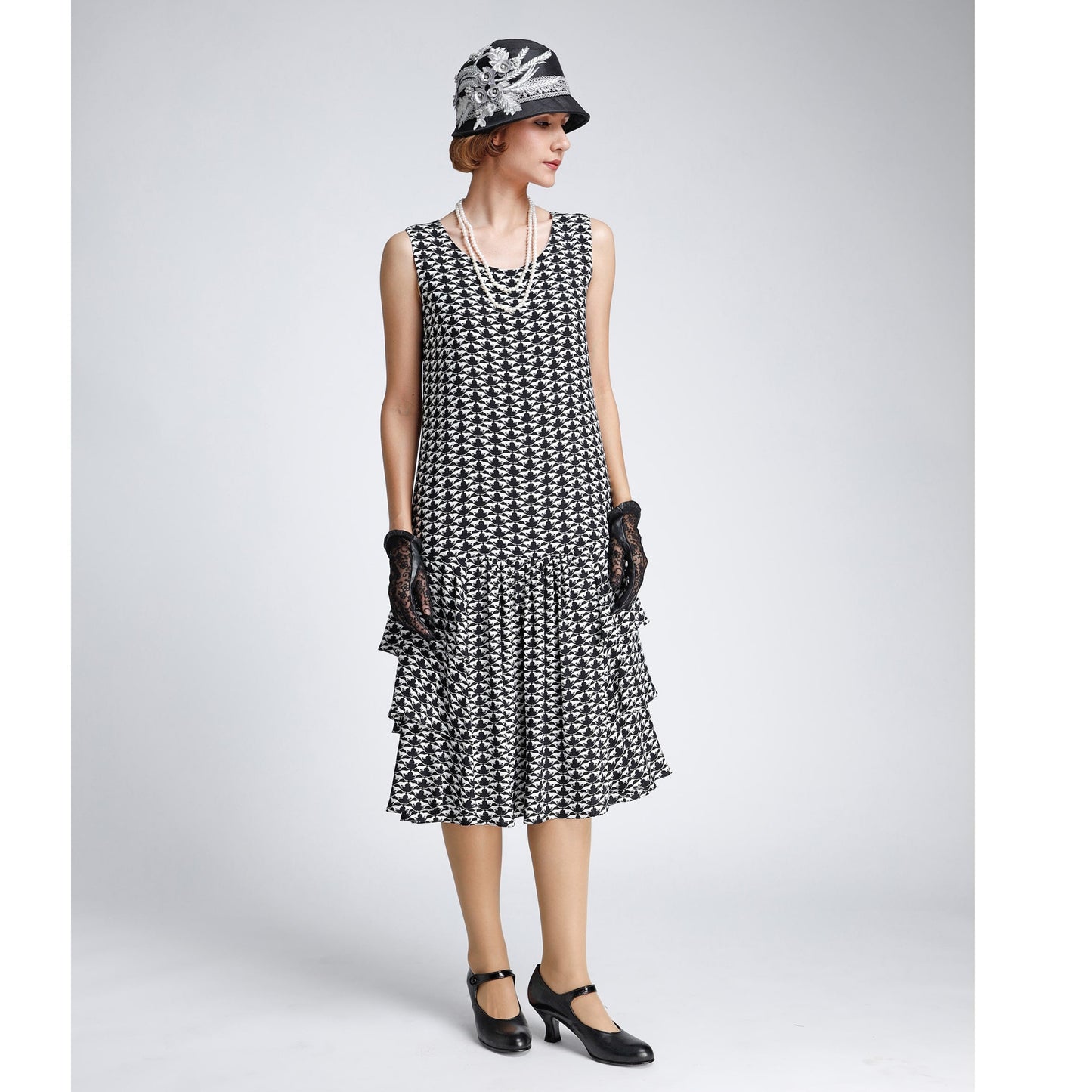 1920s black and white chiffon art deco dress with tiered skirt
