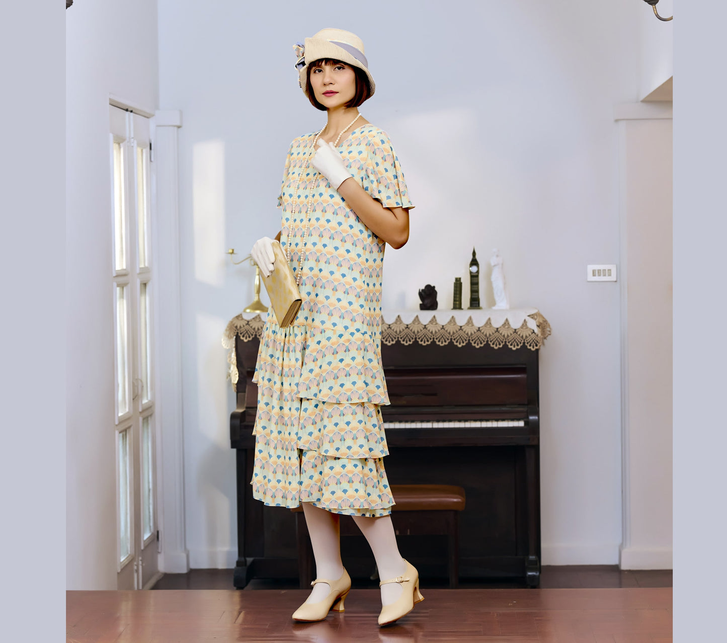 Summer art deco dress with tiered skirt and flutter sleeves
