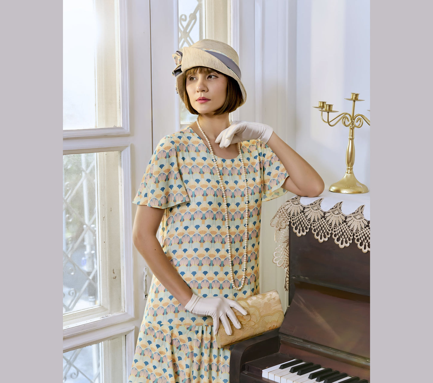 Summer art deco dress with tiered skirt and flutter sleeves