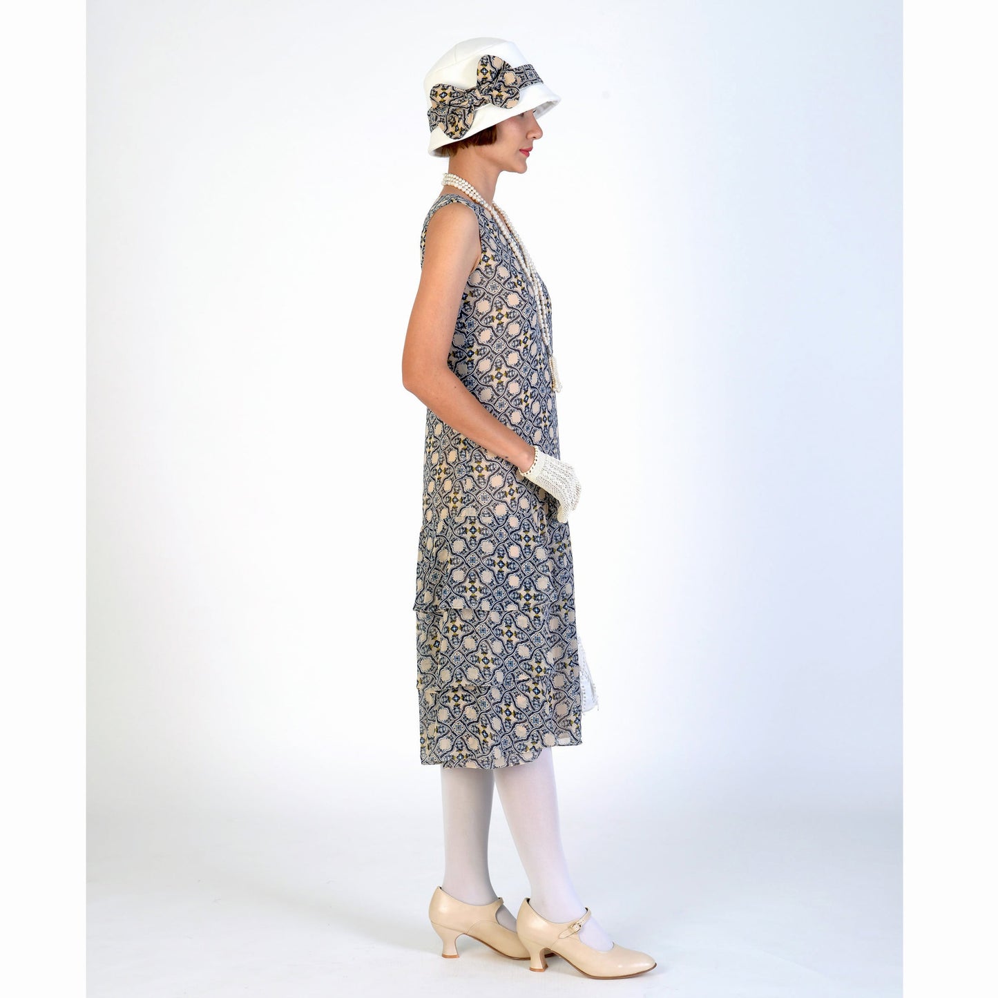Chiffon Great Gatsby dress in tile pattern print and tiered skirt. The 1920s dress or flapper can be worn as a Lady Mary dress or Downton Abbey high tea dress.