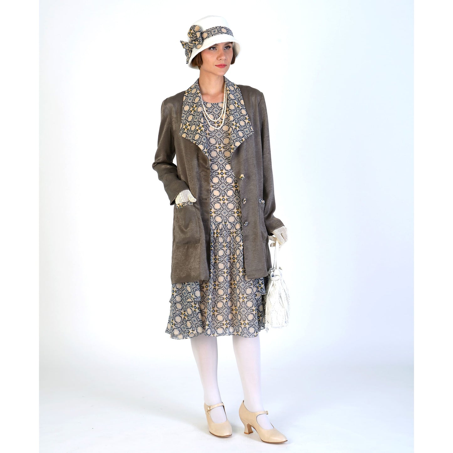 1920s cloche hat in off white and beige tile printed pattern