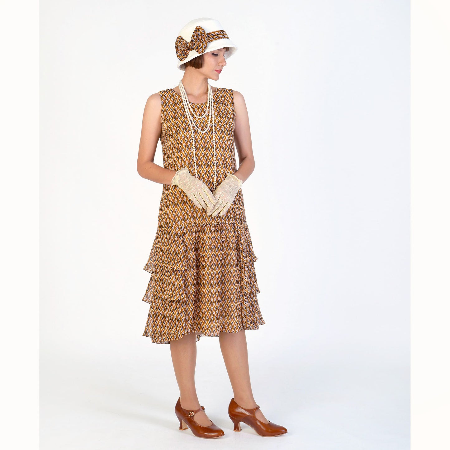 White and brown 1920s cloche hat made of cotton and printed chiffon. The 1920s hat can be worn flapper hat, Great Gatsby hat or Downton Abbey hat.