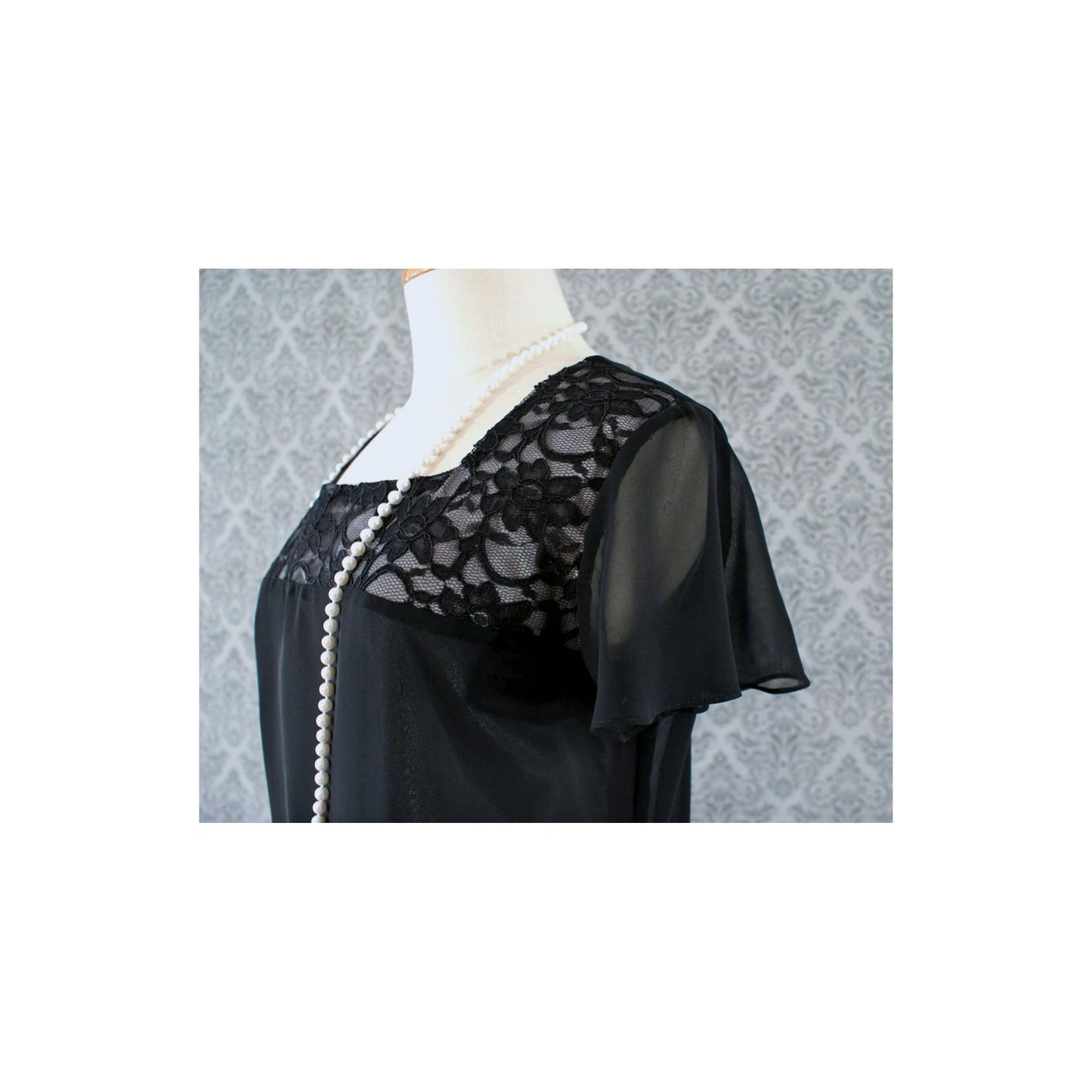 Black flapper dress with chiffon and lace with flutter sleeves