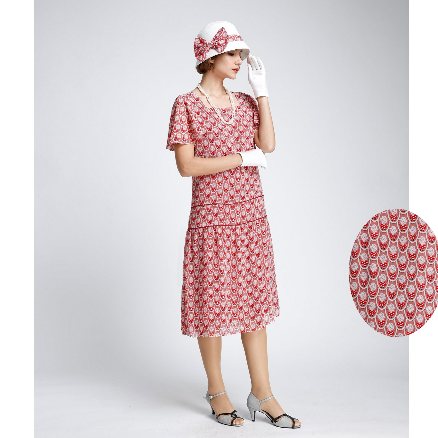 1920s tea dress made of printed red chiffon and with flutter sleeves - a 1920s fashion dress