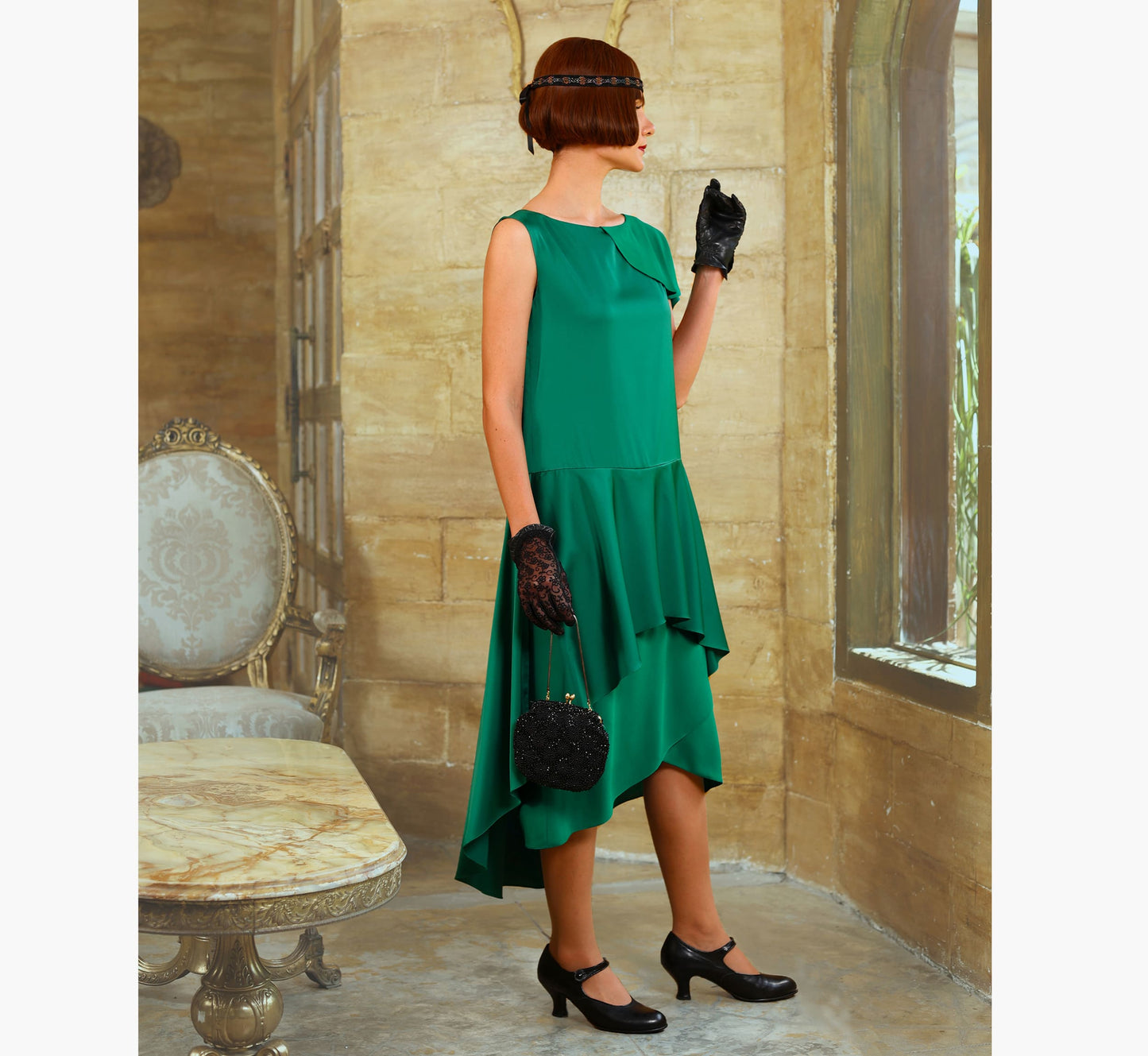 Green 1920s evening satin dress with a shoulder train