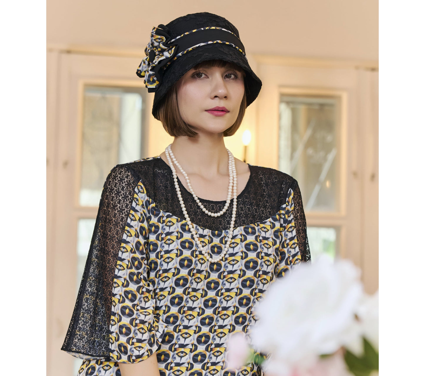 Black cloche hat with lace and art deco fabric bow - a cloche hat